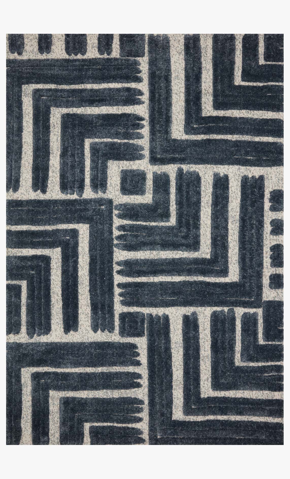Blue and white geometric block pattern power-loomed rug, close-up view