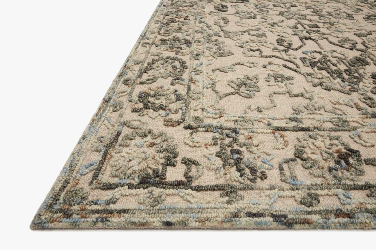 Traditional hooked rug edge with thick hooked texture, distressed grey and sky design