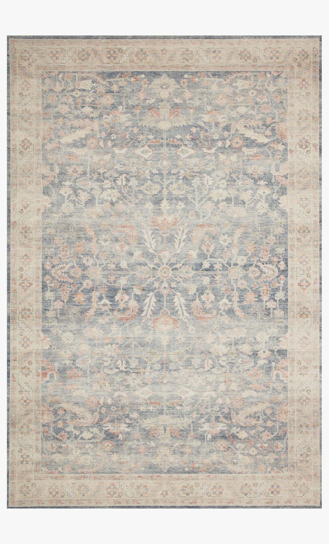 Traditional power-loomed rug with blue and cream ornate pattern and border, rectangular