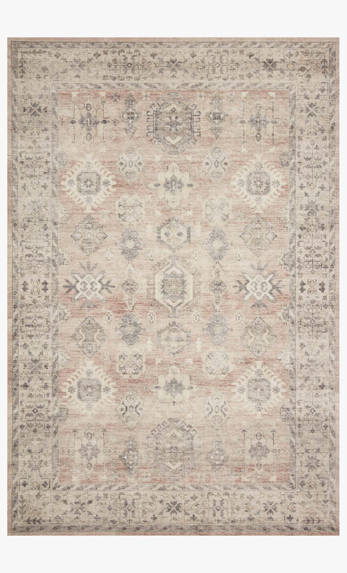 Traditional power-loomed rug with distressed medallions in light beige, gray, and muted pink.