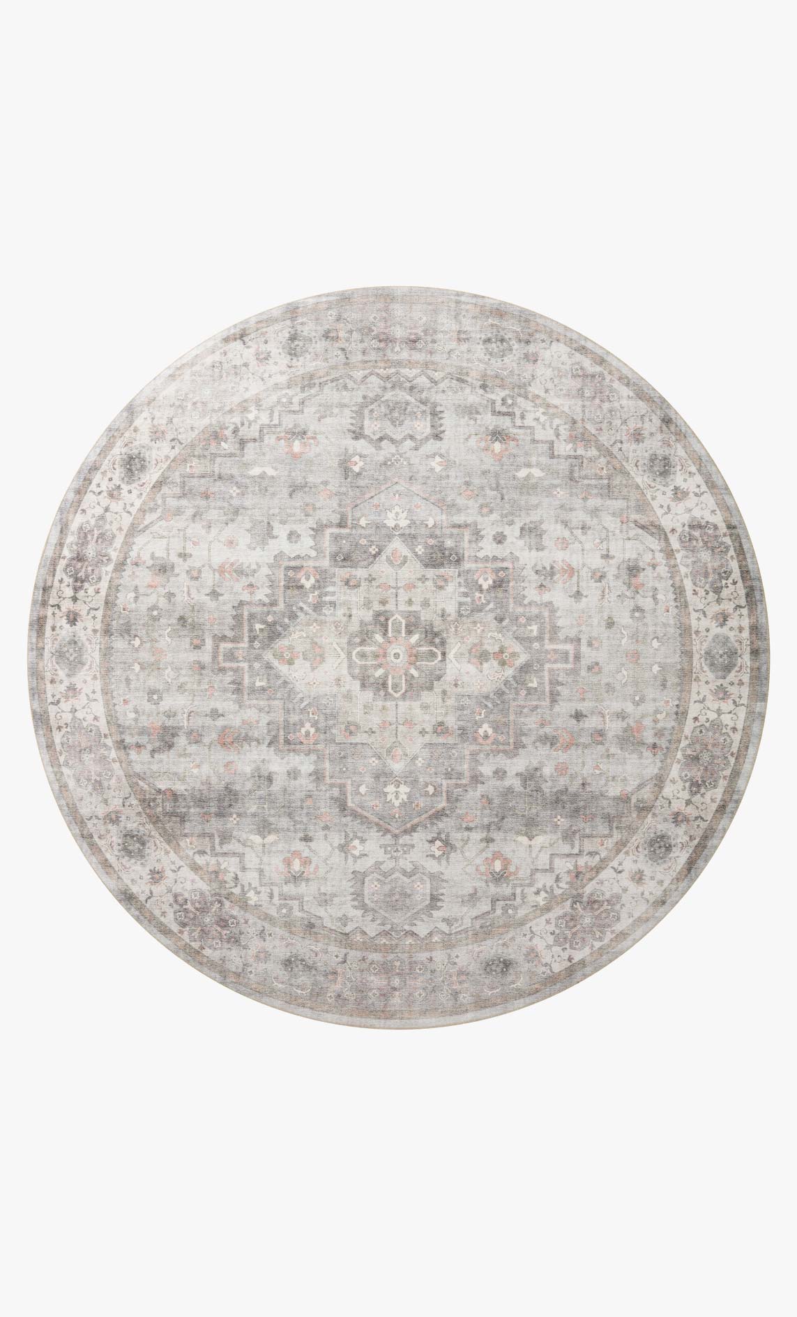 Round traditional power-loomed rug in dove gray with geometric pattern and blush flecks.