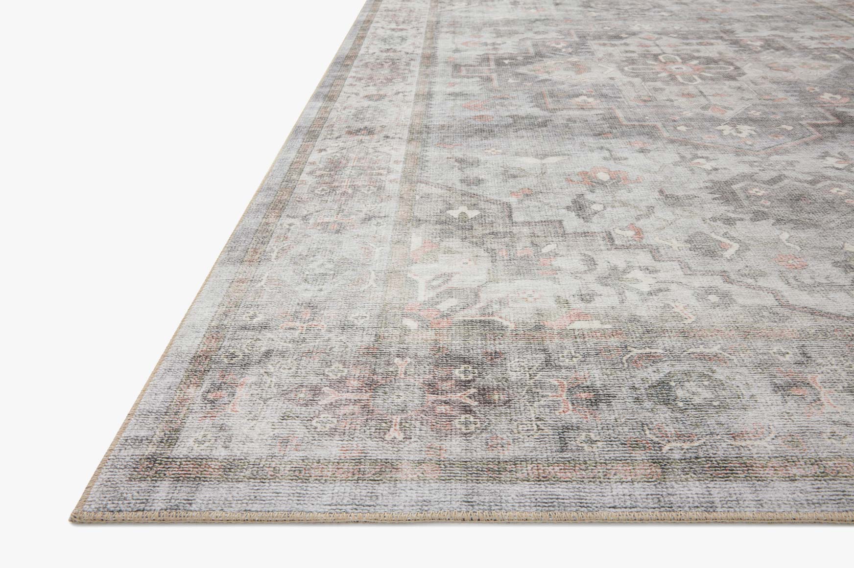Traditional power-loomed rug with dove gray field and ornate center medallion design.