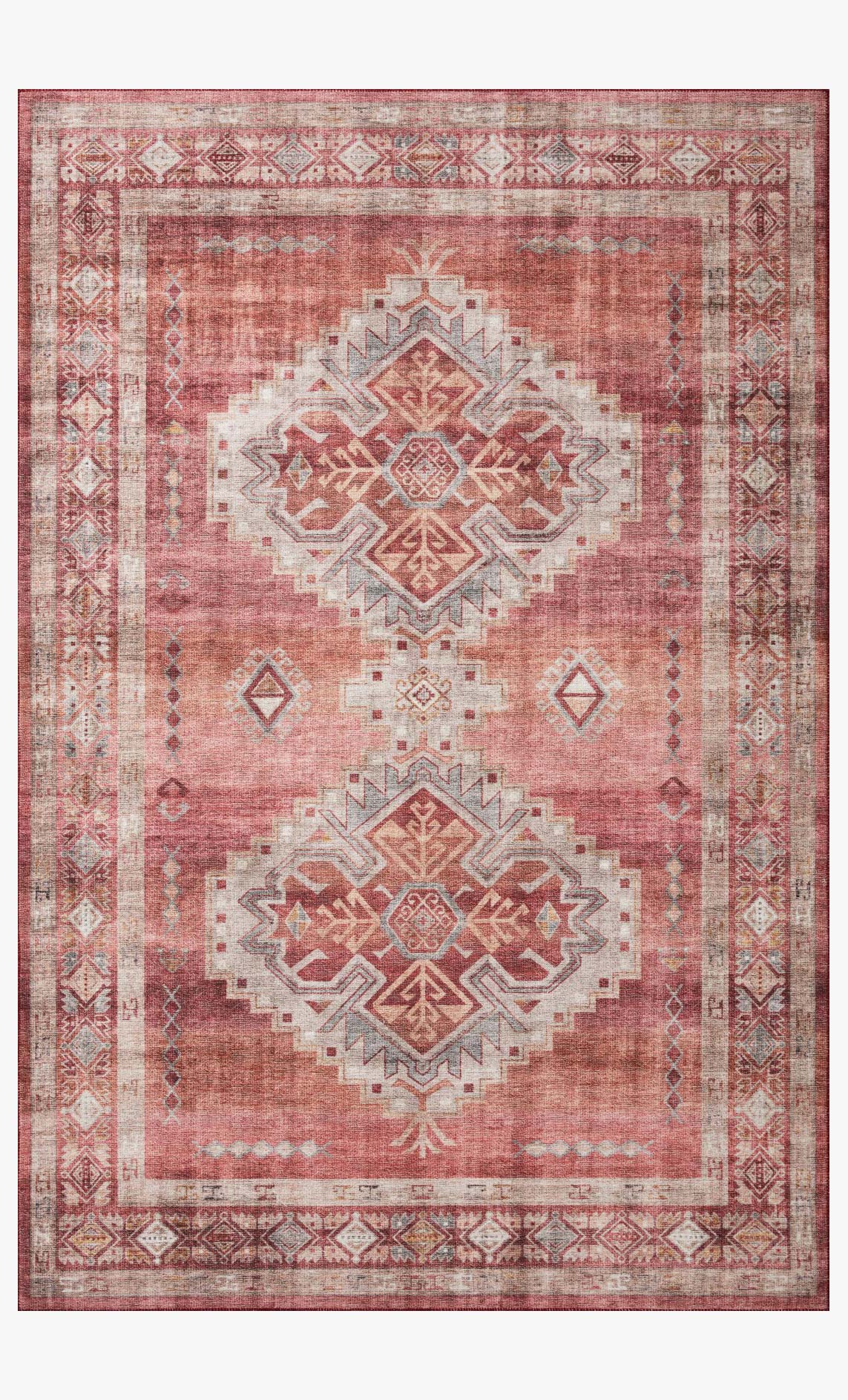 Traditional area rug with faded rust red field, ivory geometric medallions, and border.
