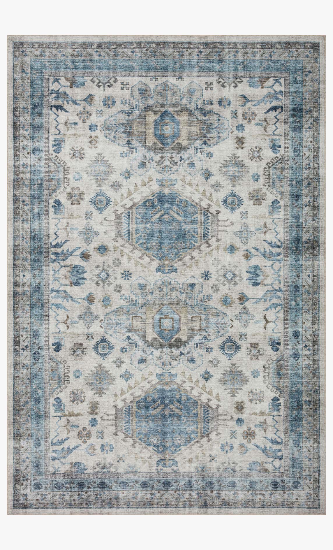Traditional power-loomed rug with ivory and ocean geometric medallion pattern and border