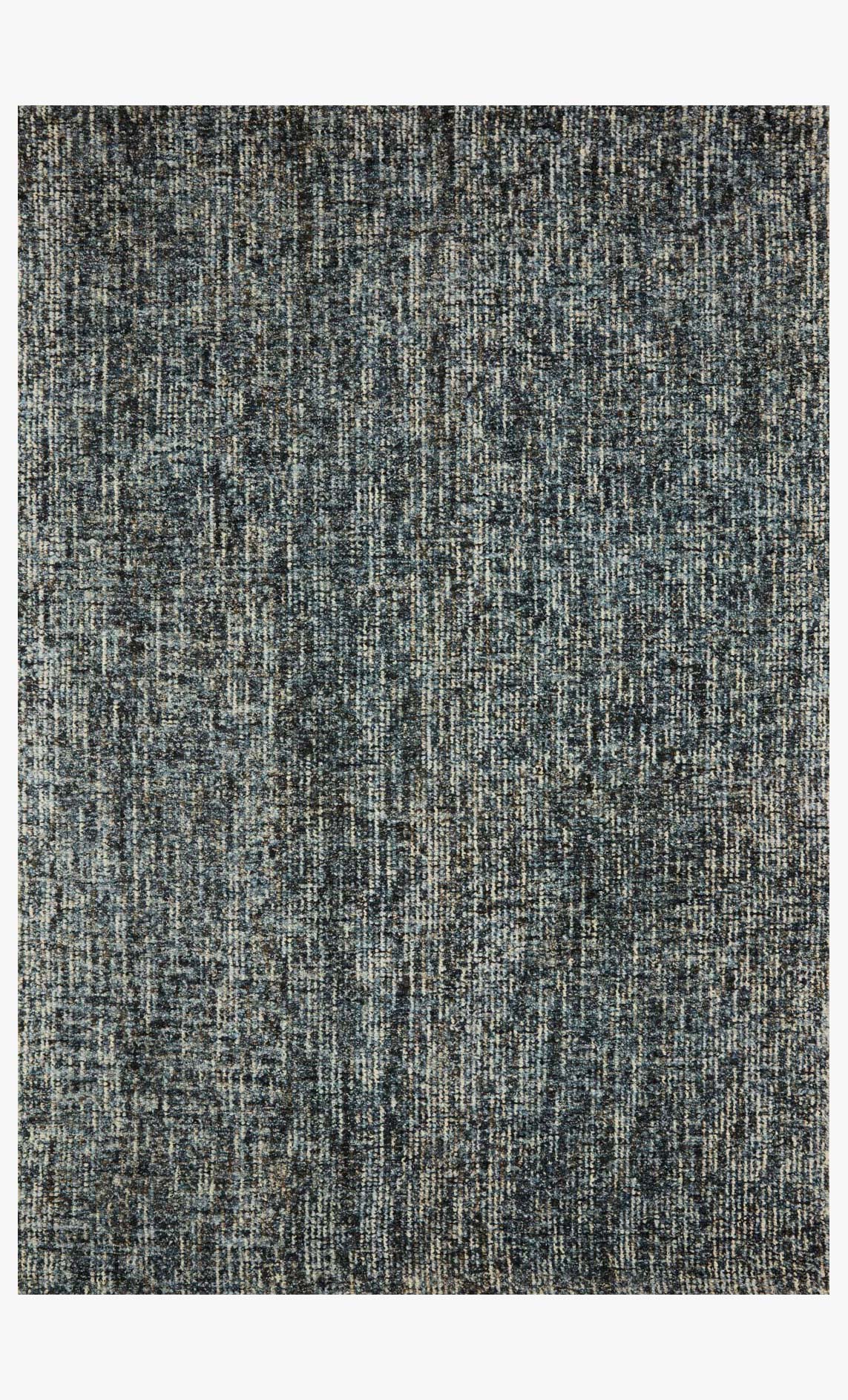 Denim-and-charcoal hand-tufted area rug with textured multicolor pattern