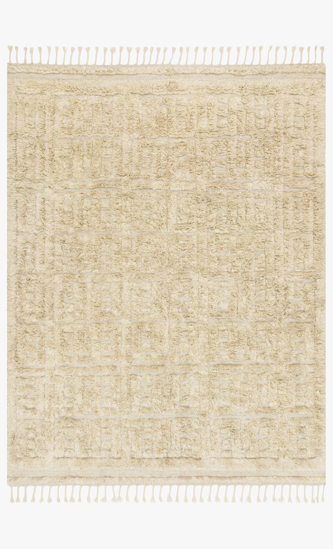 Light beige hand-loomed rug with fringe border and subtle geometric pattern