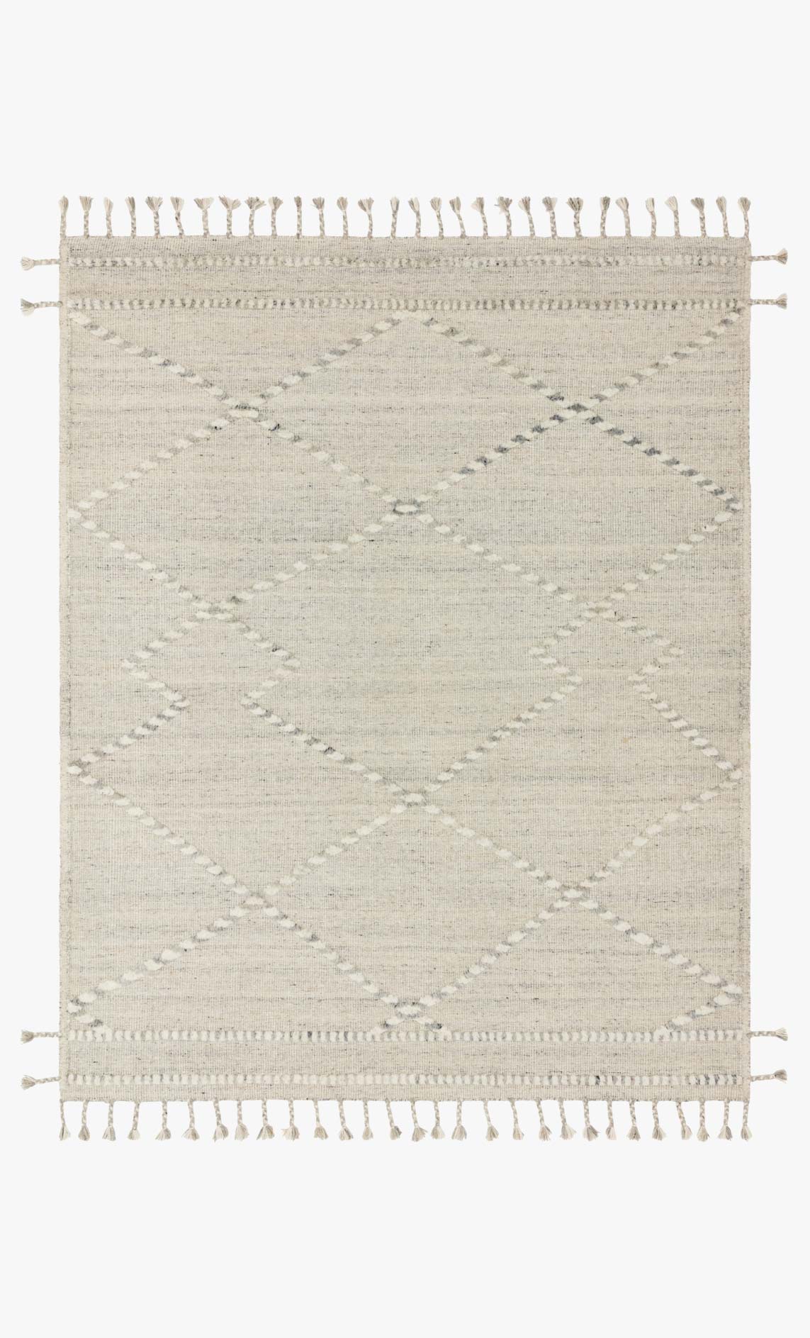 Hand-knotted area rug with ivory base, light gray diamond pattern, and short fringe