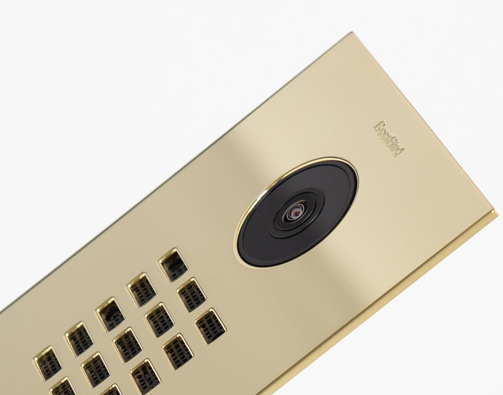 Brass IP video door station close-up of camera and keypad button matrix