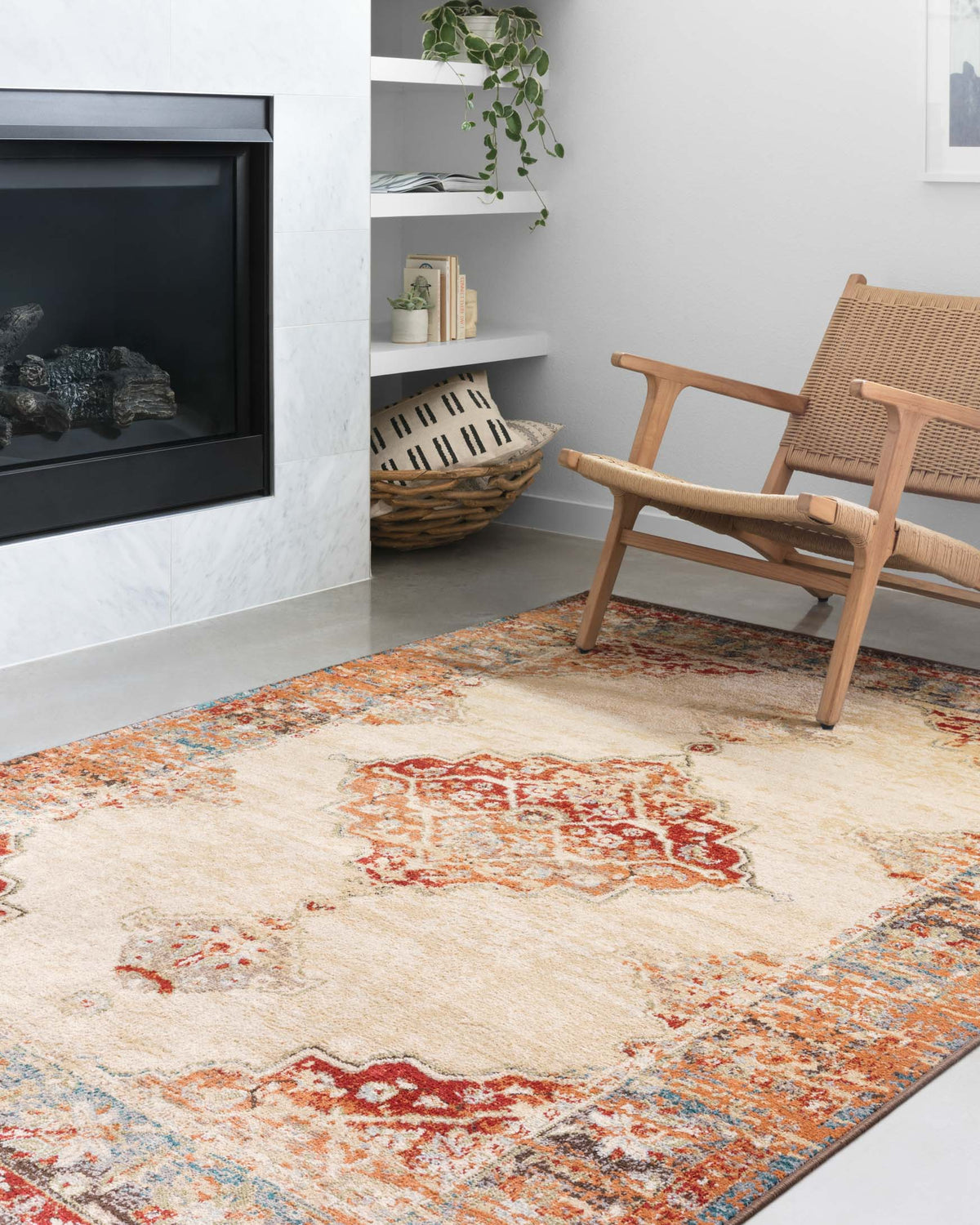 Distressed antique ivory rug with orange rust center medallion, teal and blue patterning