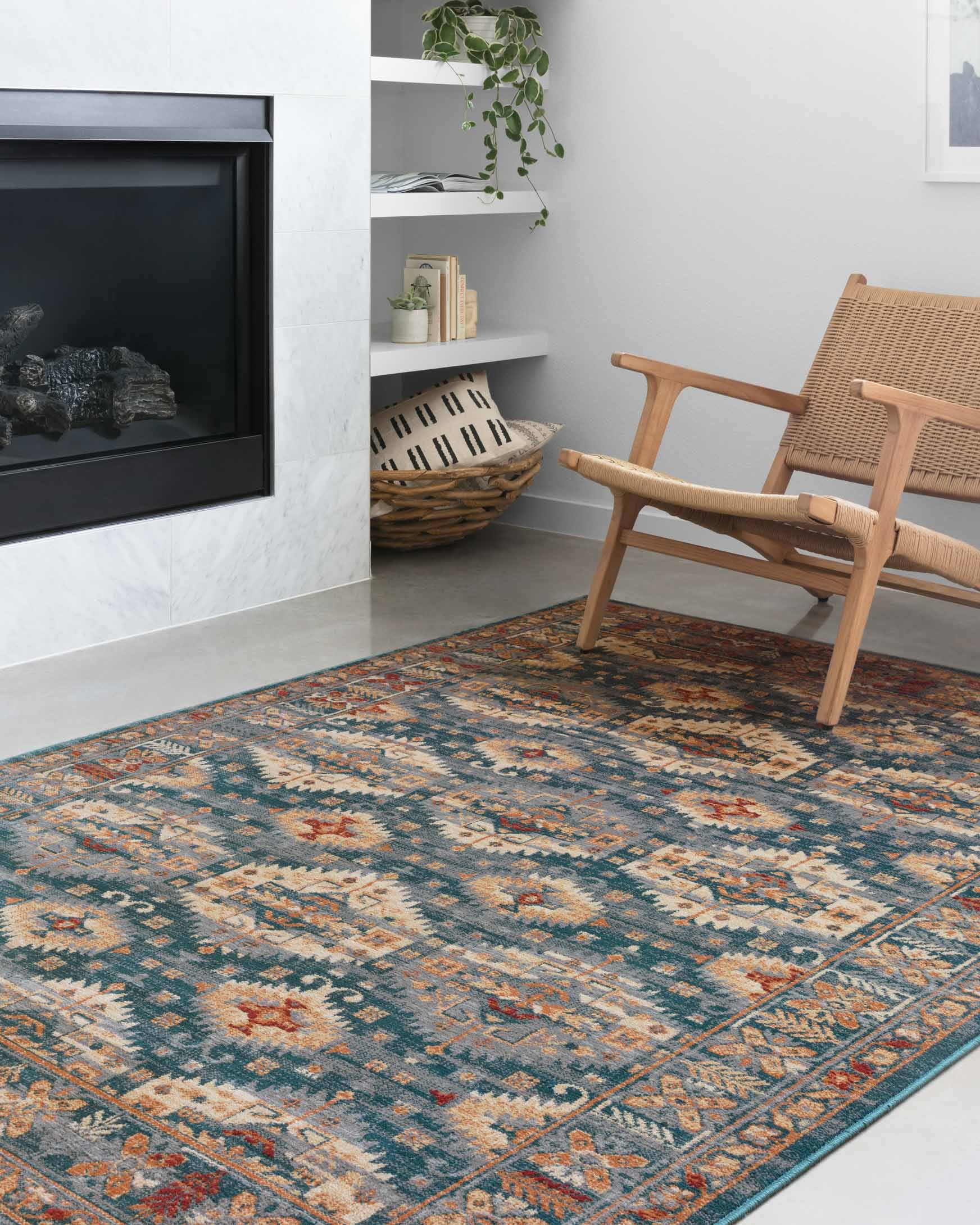 Lagoon patterned power-loomed rug in teal and orange with vintage-style medallion motifs