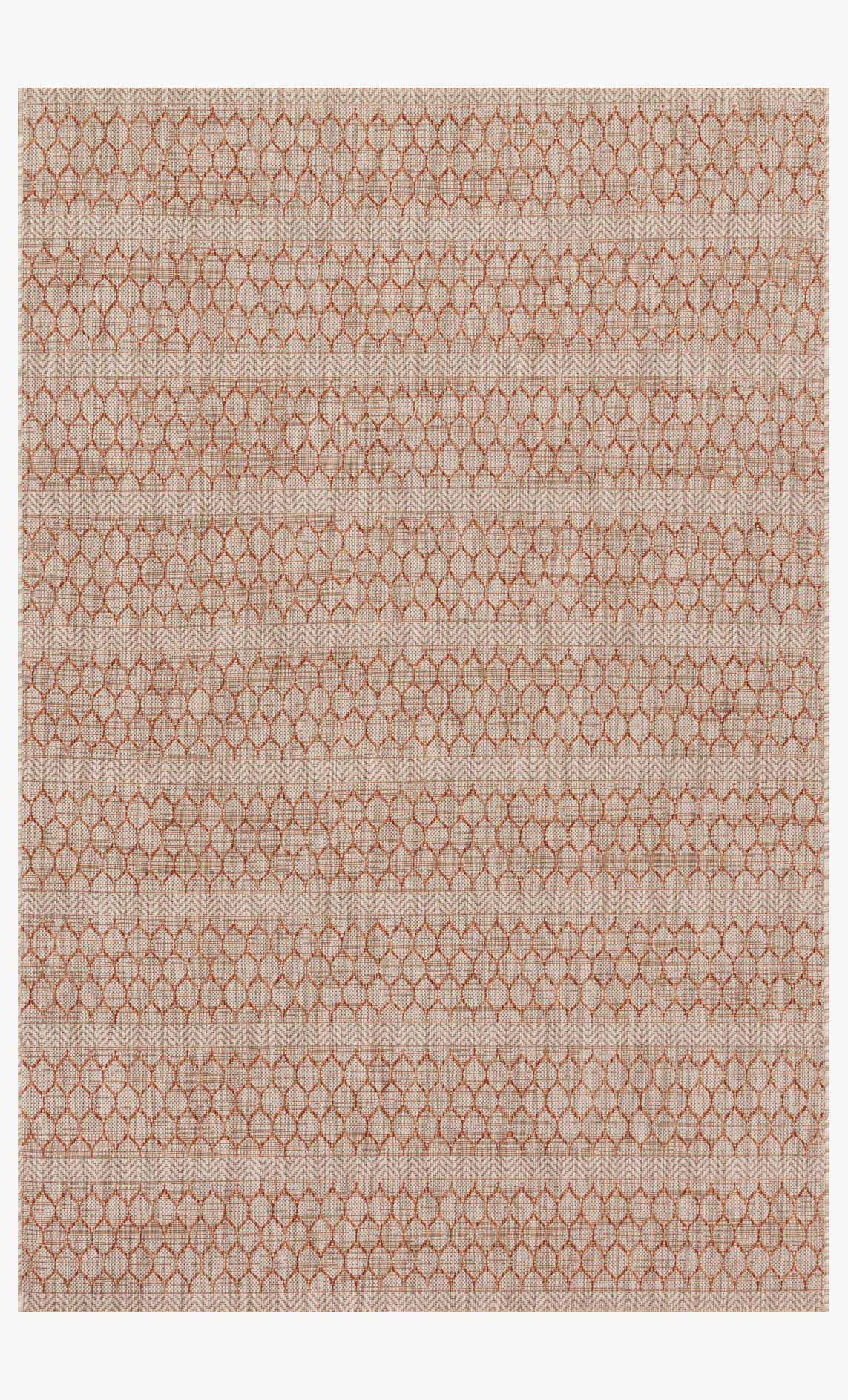 Beige indoor/outdoor power-loomed rug with rust diamond lattice and horizontal bands
