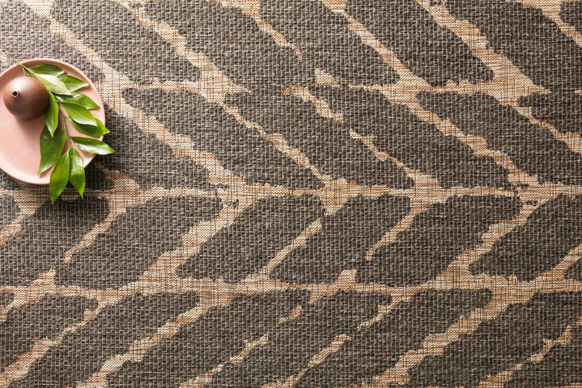 Charcoal rug with textured mocha chevrons, close-up pattern detail