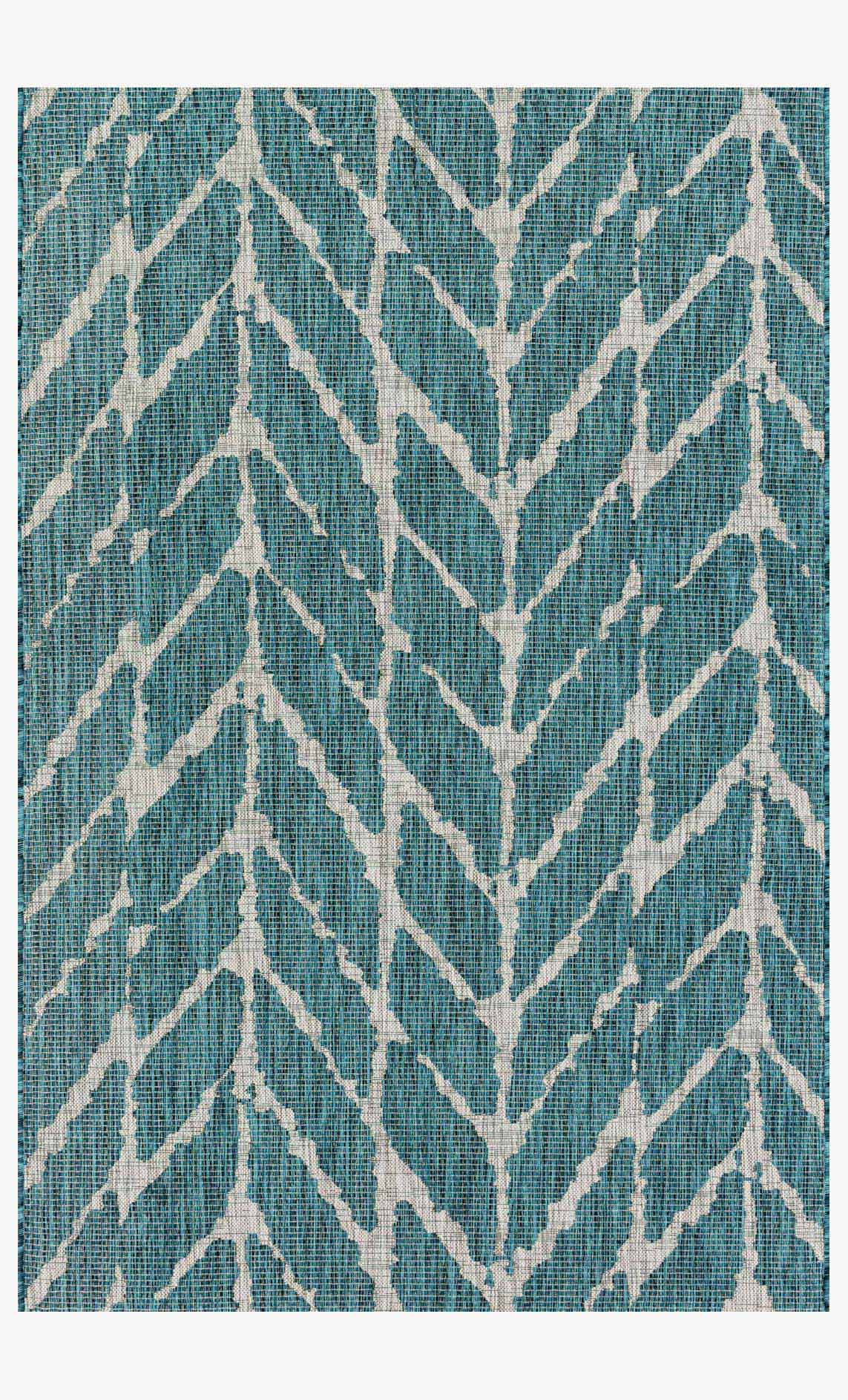 Teal and grey indoor/outdoor rug with white chevron stripe pattern