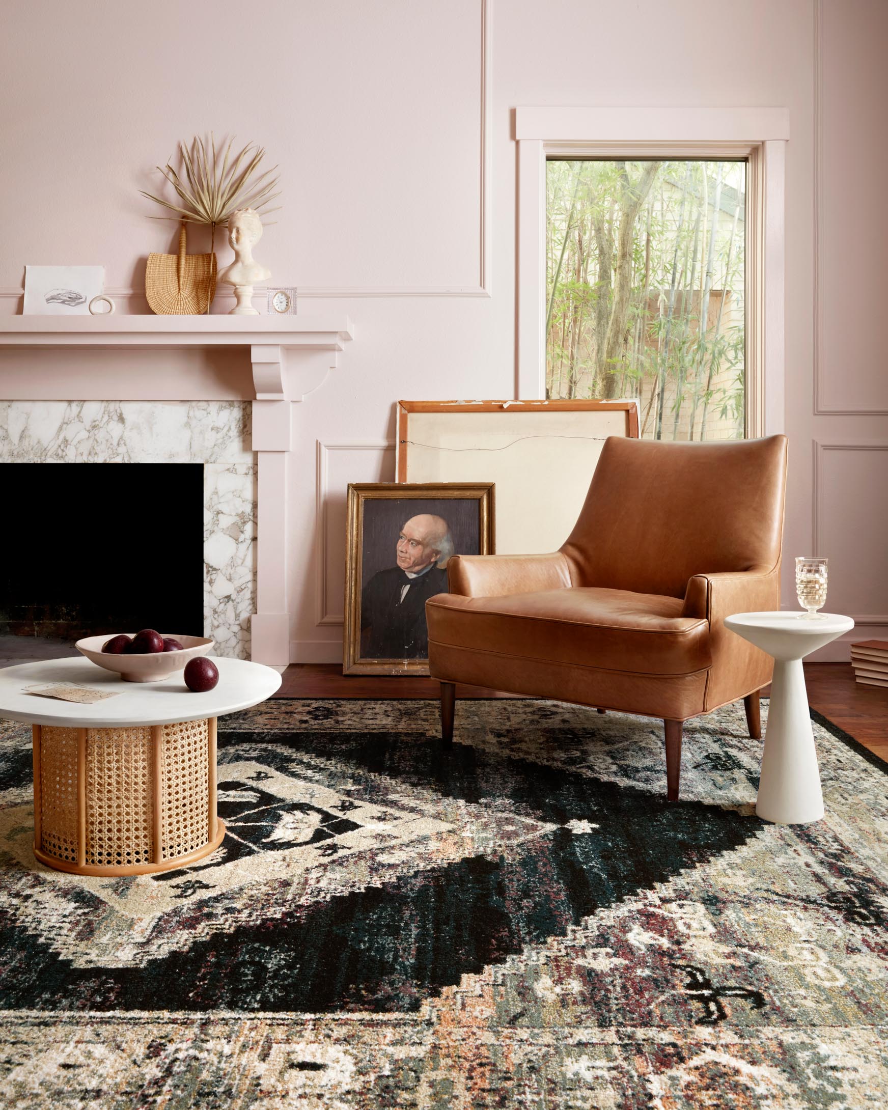 Contemporary power-loomed rug with distressed geometric pattern, dark ink border, cream field