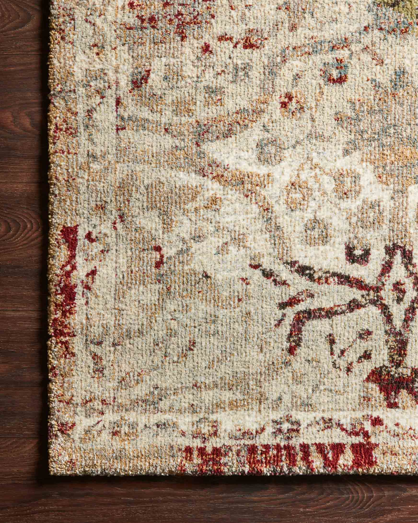 Cream and silver rug texture with burgundy floral medallion accents