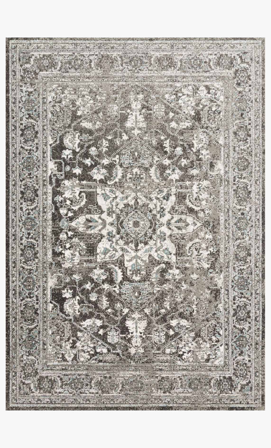 Traditional power-loomed rug in charcoal and ivory with ornate central medallion.