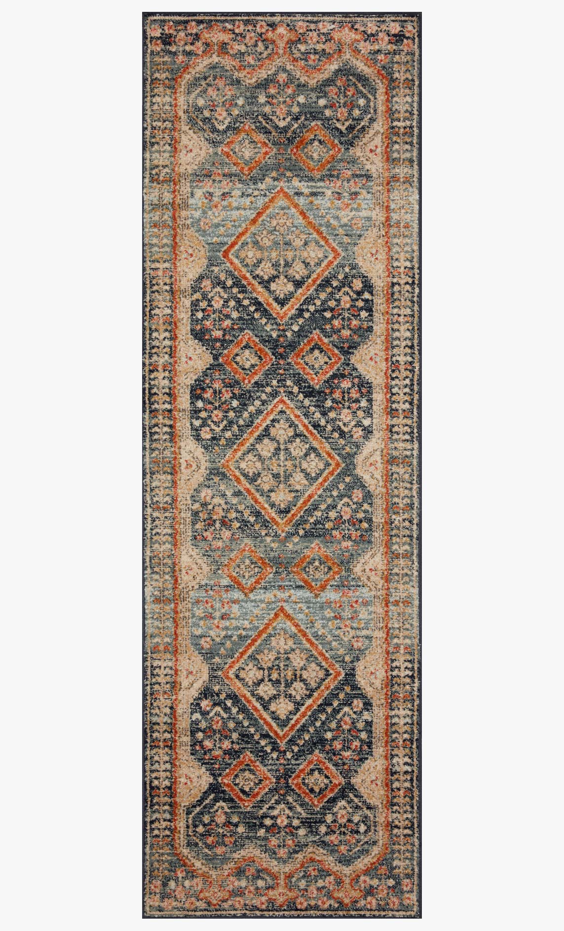 Narrow rectangular rug in navy with beige and orange diamond and medallion motifs
