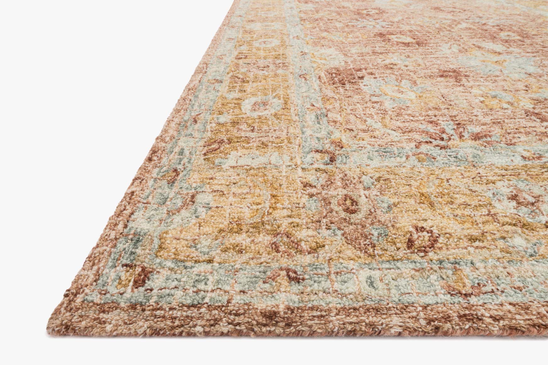 Transitional hooked rug corner view, terracotta and gold abstract texture with light blue