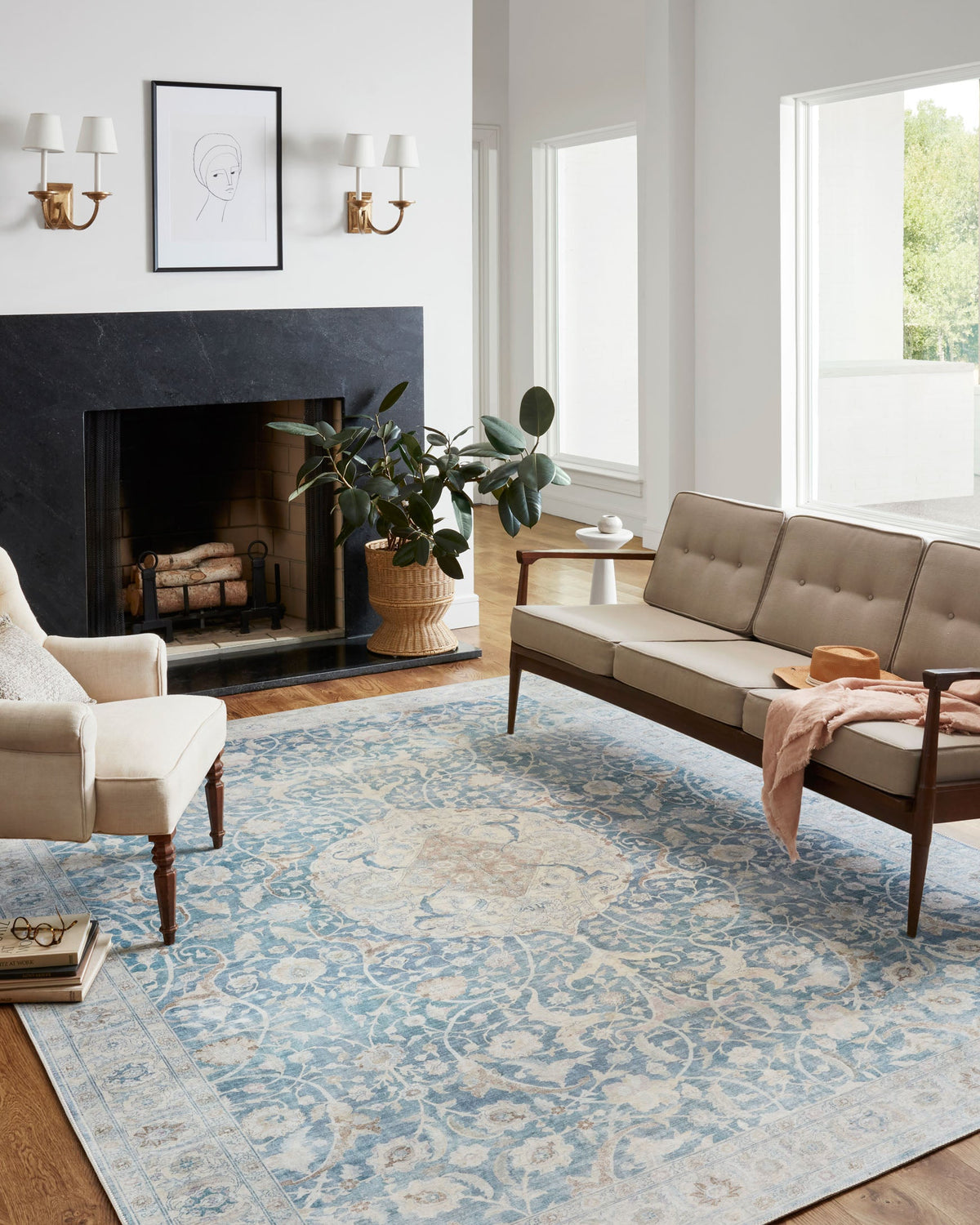 Traditional power-loomed rug, antique cream and sky blue, vintage-inspired scrollwork design.