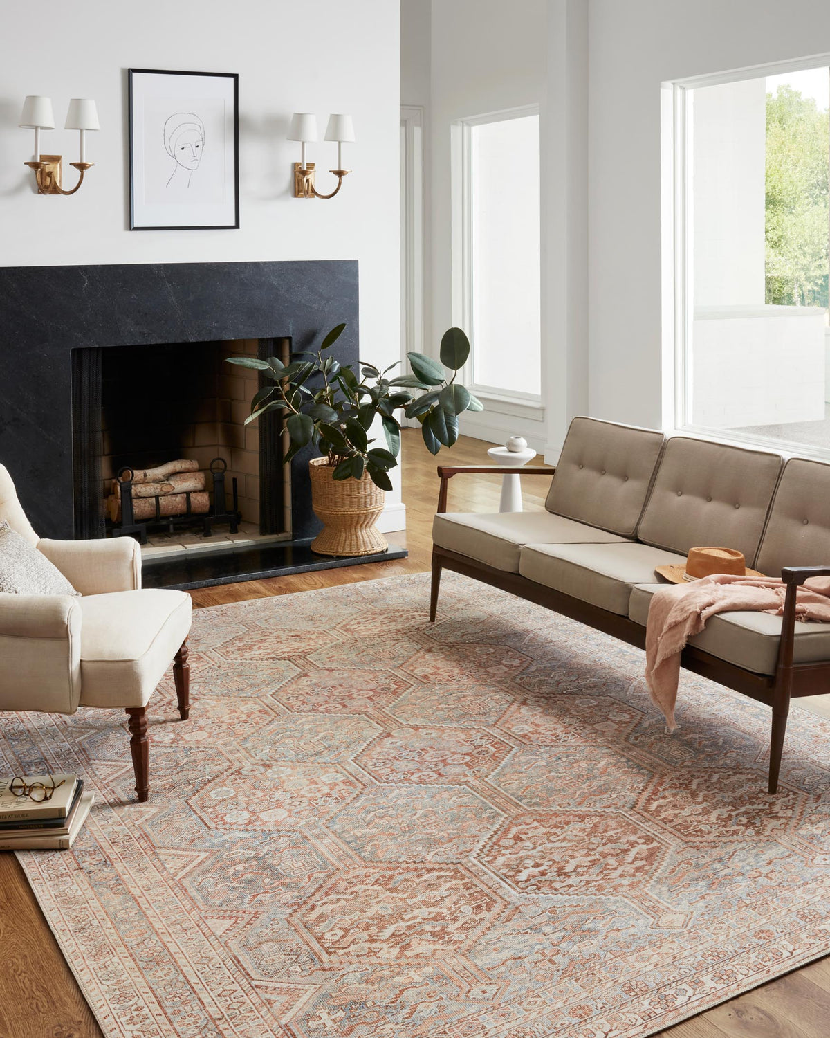 Tangerine and mist power-loomed rug featuring repeating geometric panels and borders