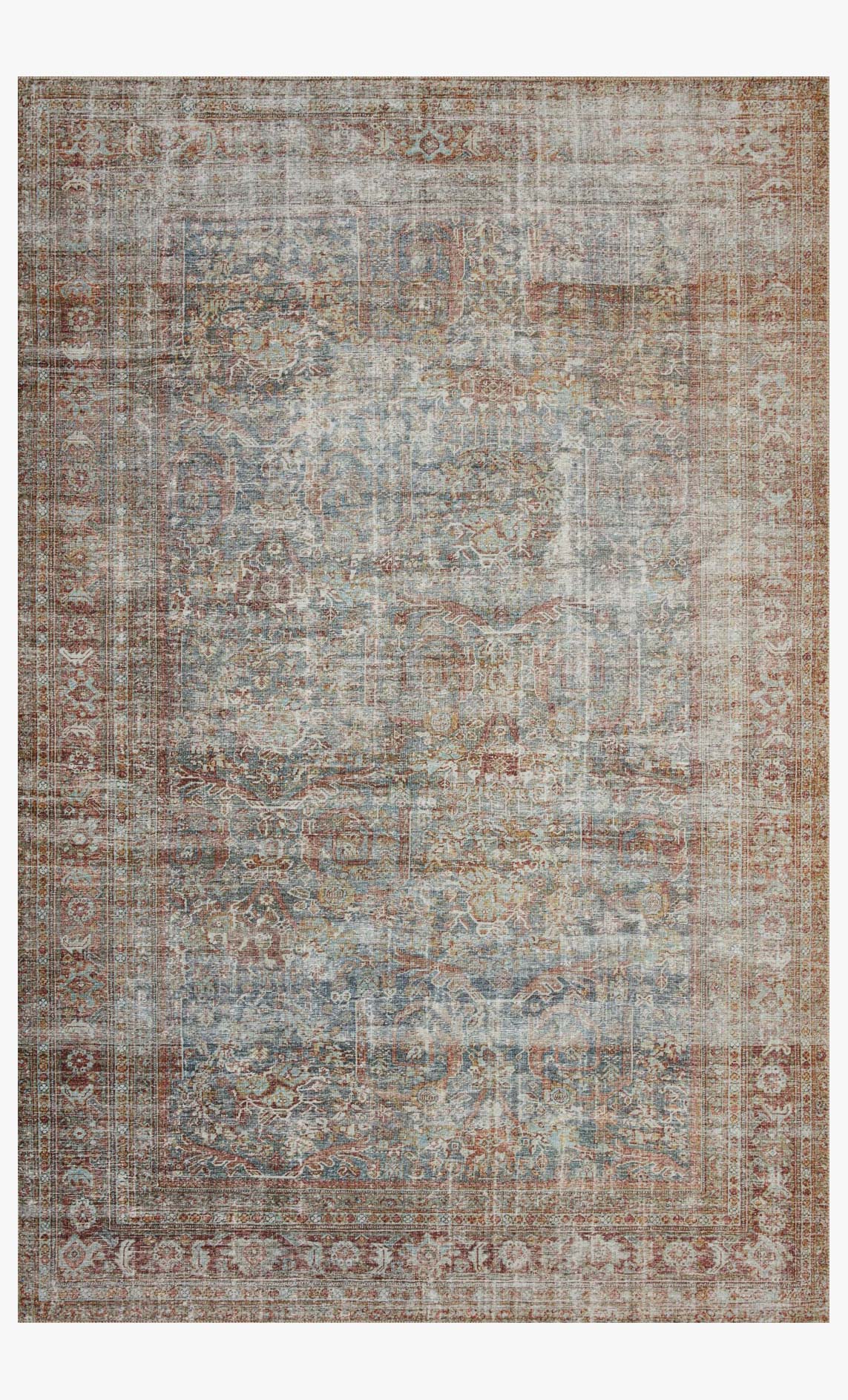 Rectangular traditional power-loomed rug with muted blue and rust patterned design
