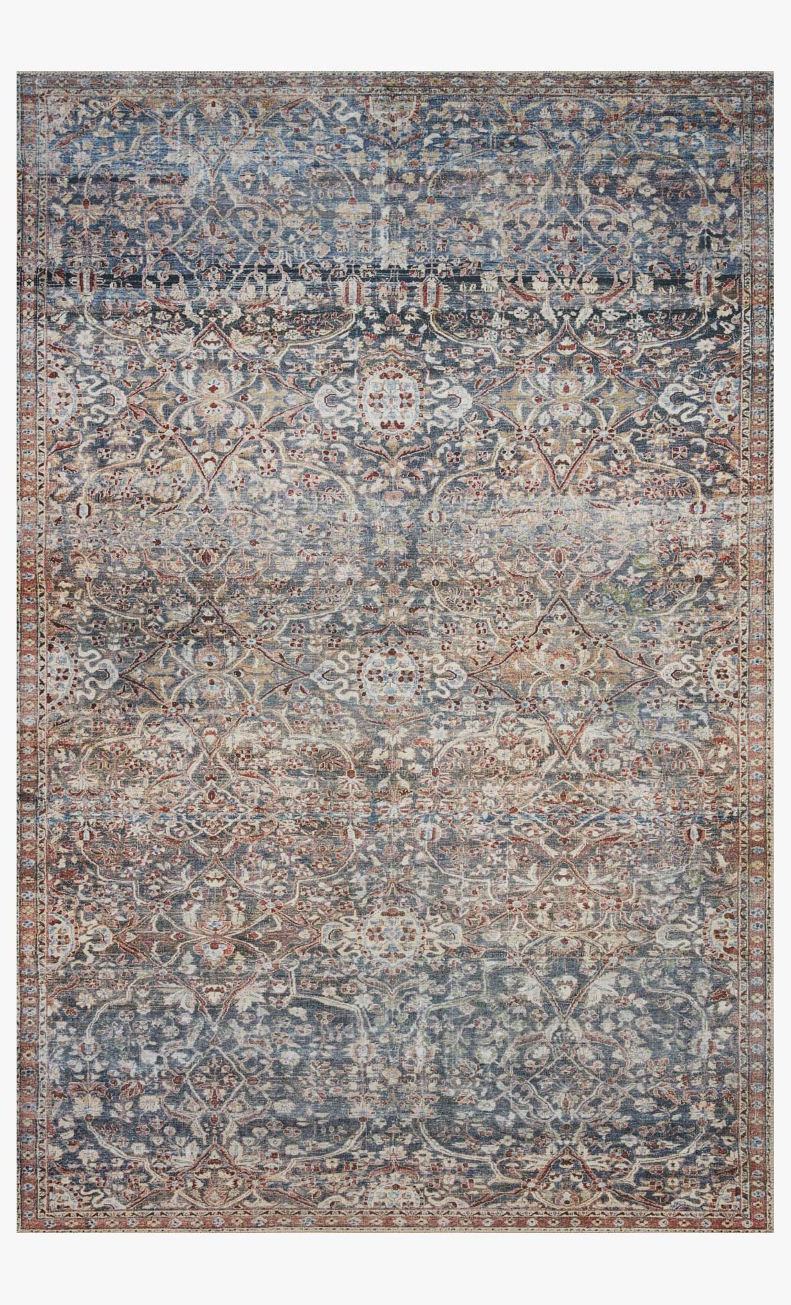 Traditional power-loomed area rug with ornate blue, tan, and spice medallion pattern