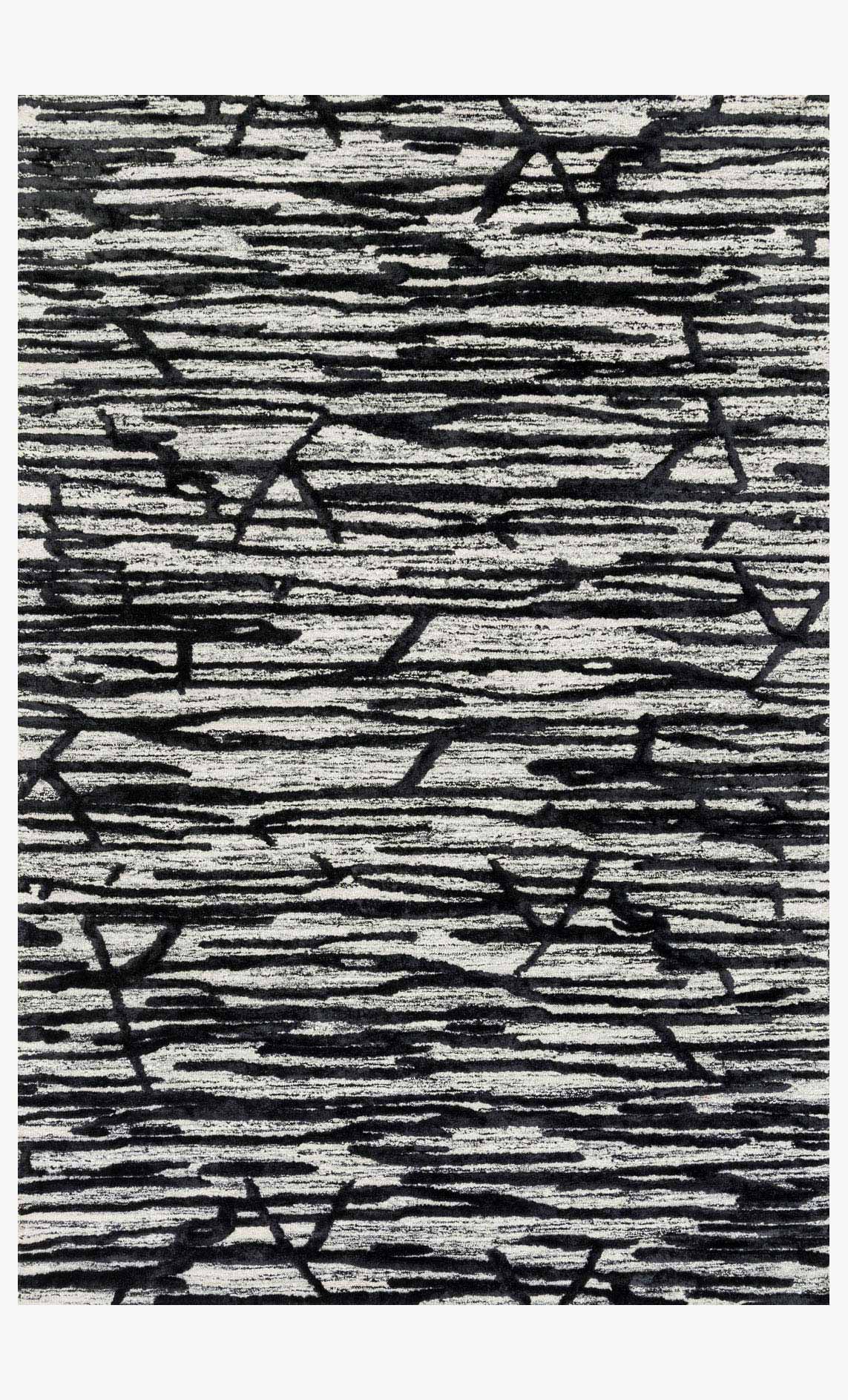 Hand-tufted rug with ivory base and black geometric block pattern