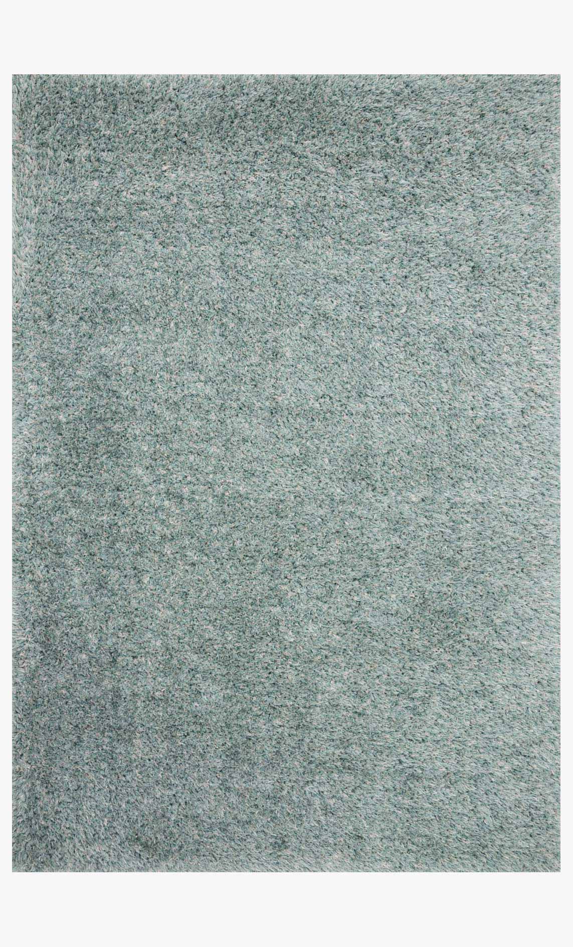 Blue-green shag power-loomed rug, dense textured pile with flat border