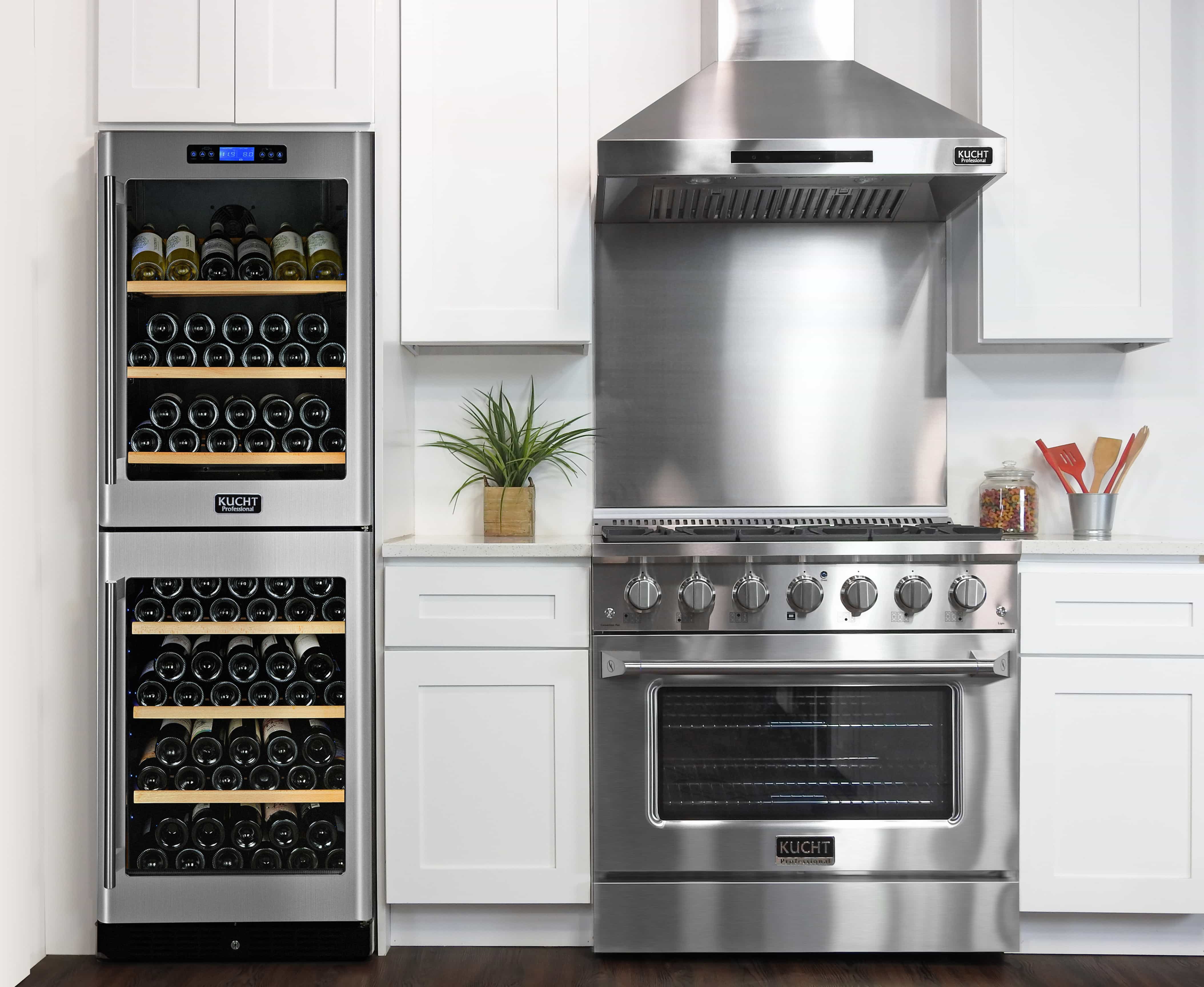 Stainless steel dual fuel range in kitchen with oven door and control panel