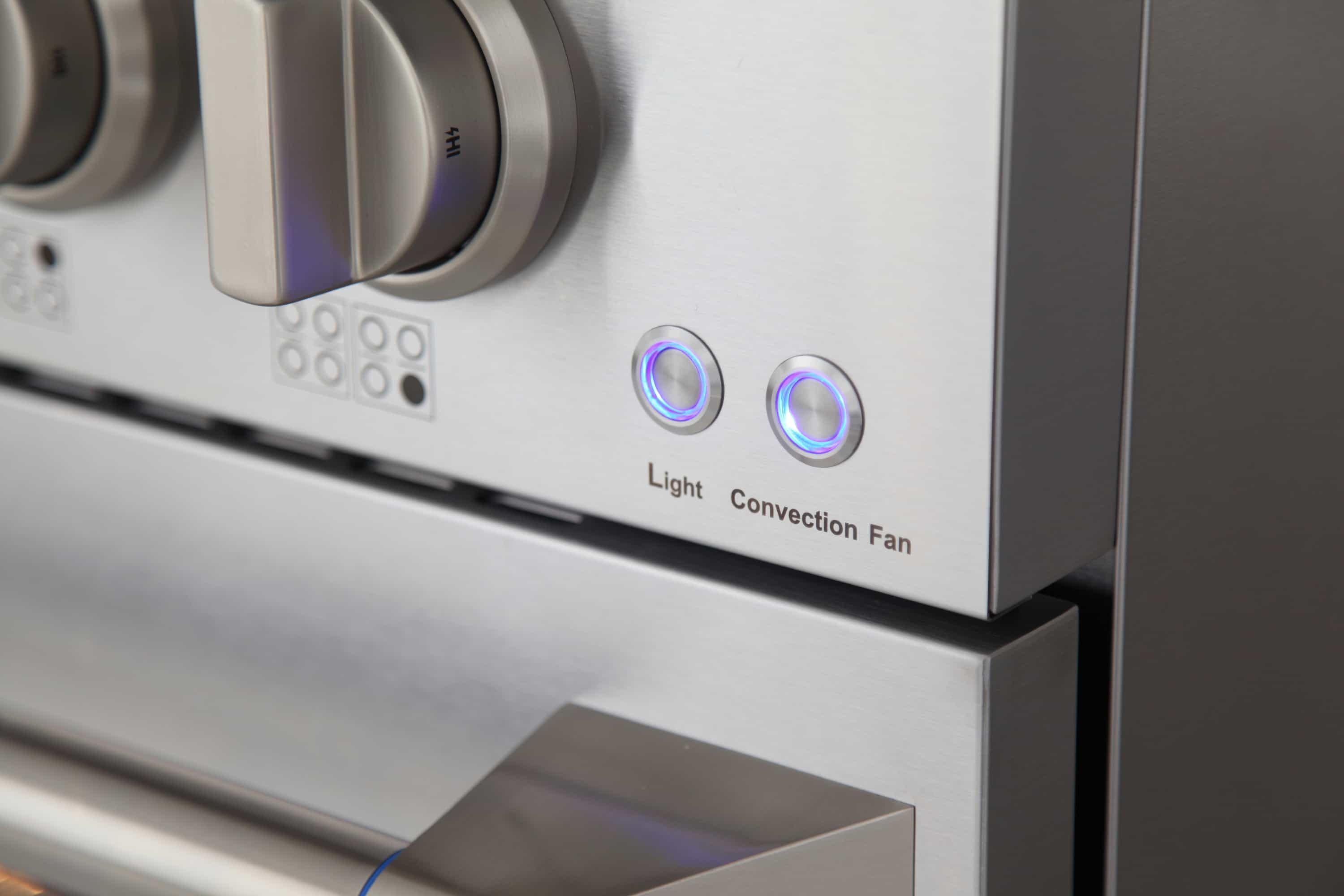 Control area with “Light” and “Convection Fan” buttons on stainless steel range
