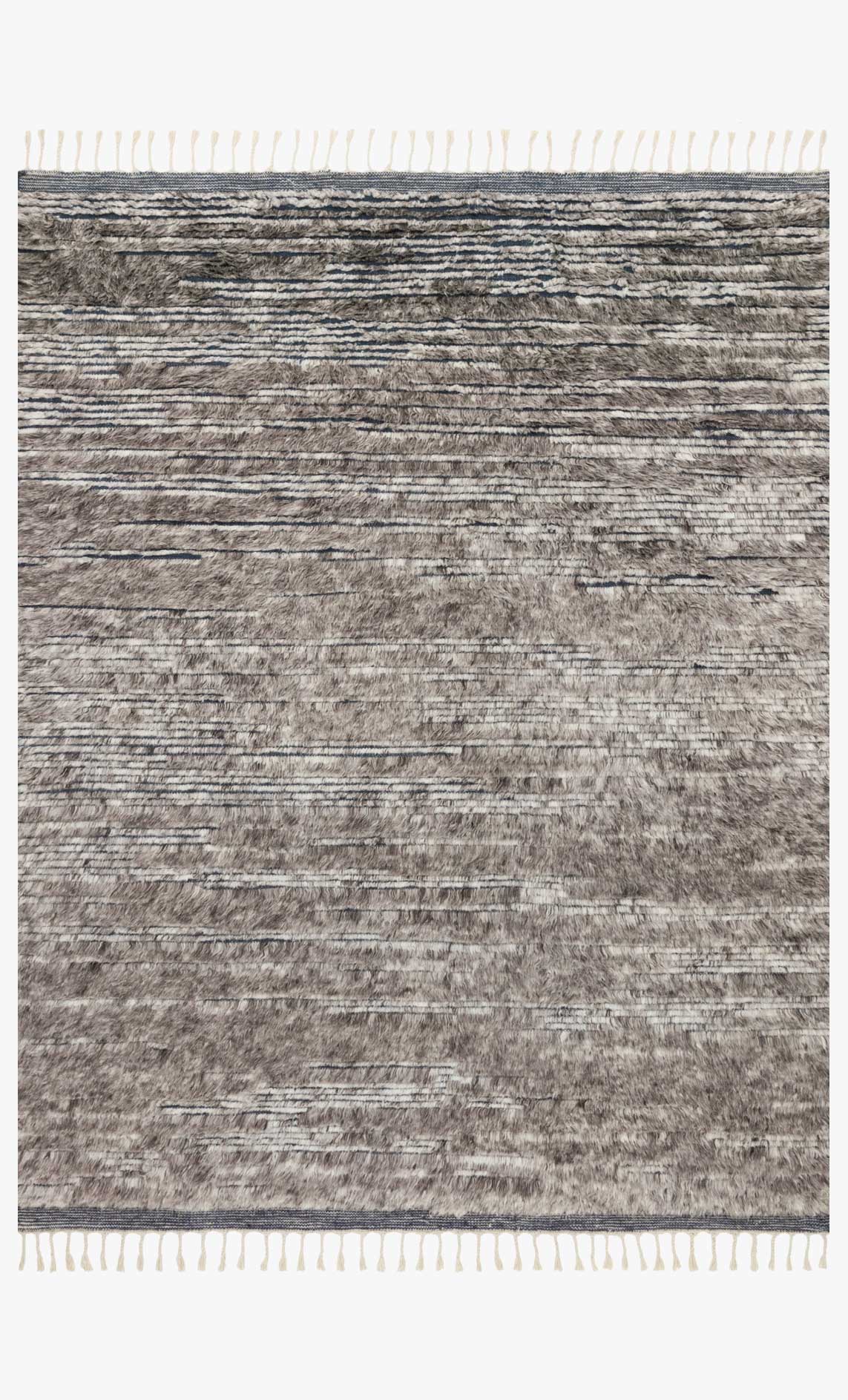 Hand-knotted area rug with mottled gray stripes and white fringe edges