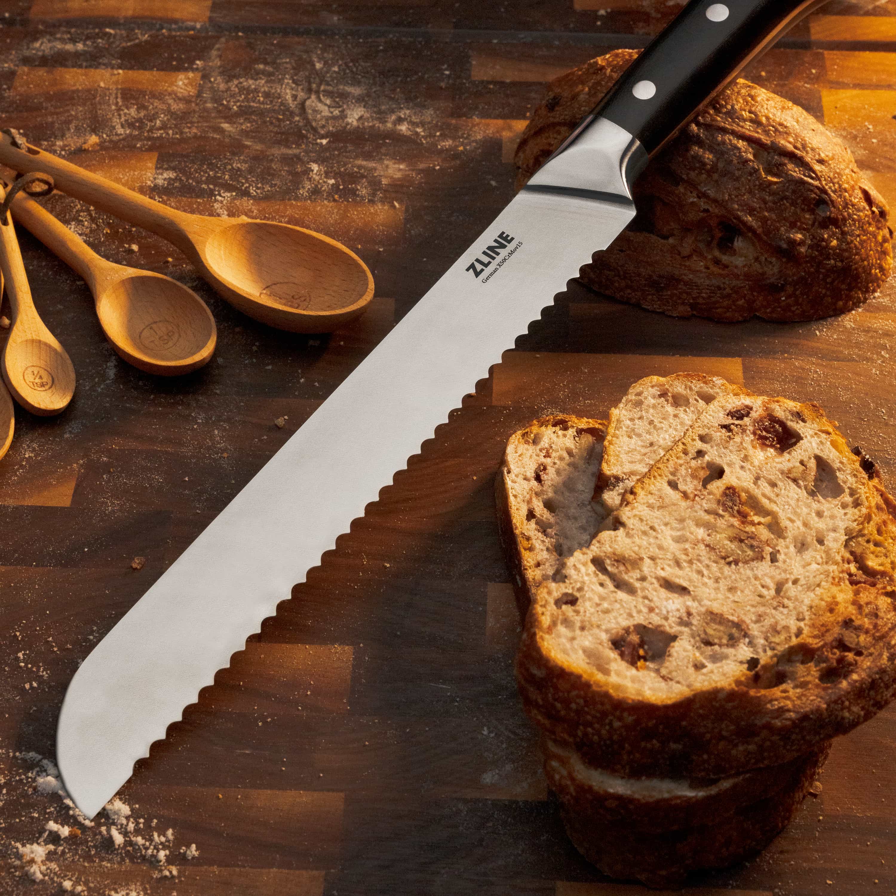 ZLINE serrated kitchen knife with white steel blade and black handle, three rivets