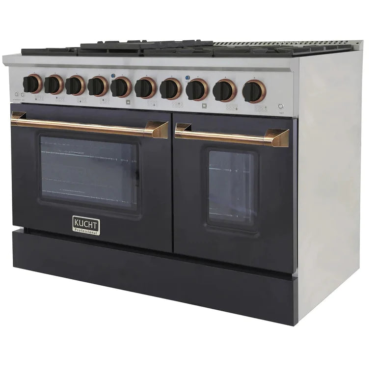 Gas range with black oven windows, gold bar handles, and stainless control dial row