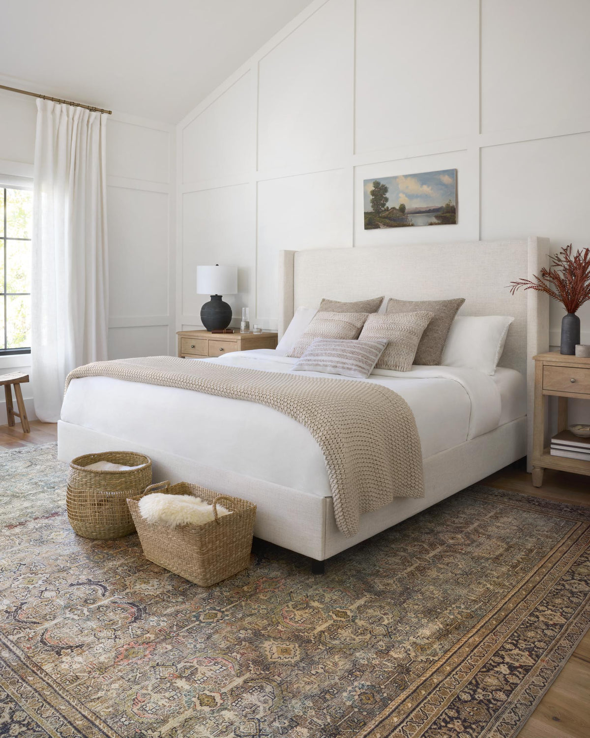 Traditional power-loomed rug with decorative border and distressed pattern, olive and charcoal.