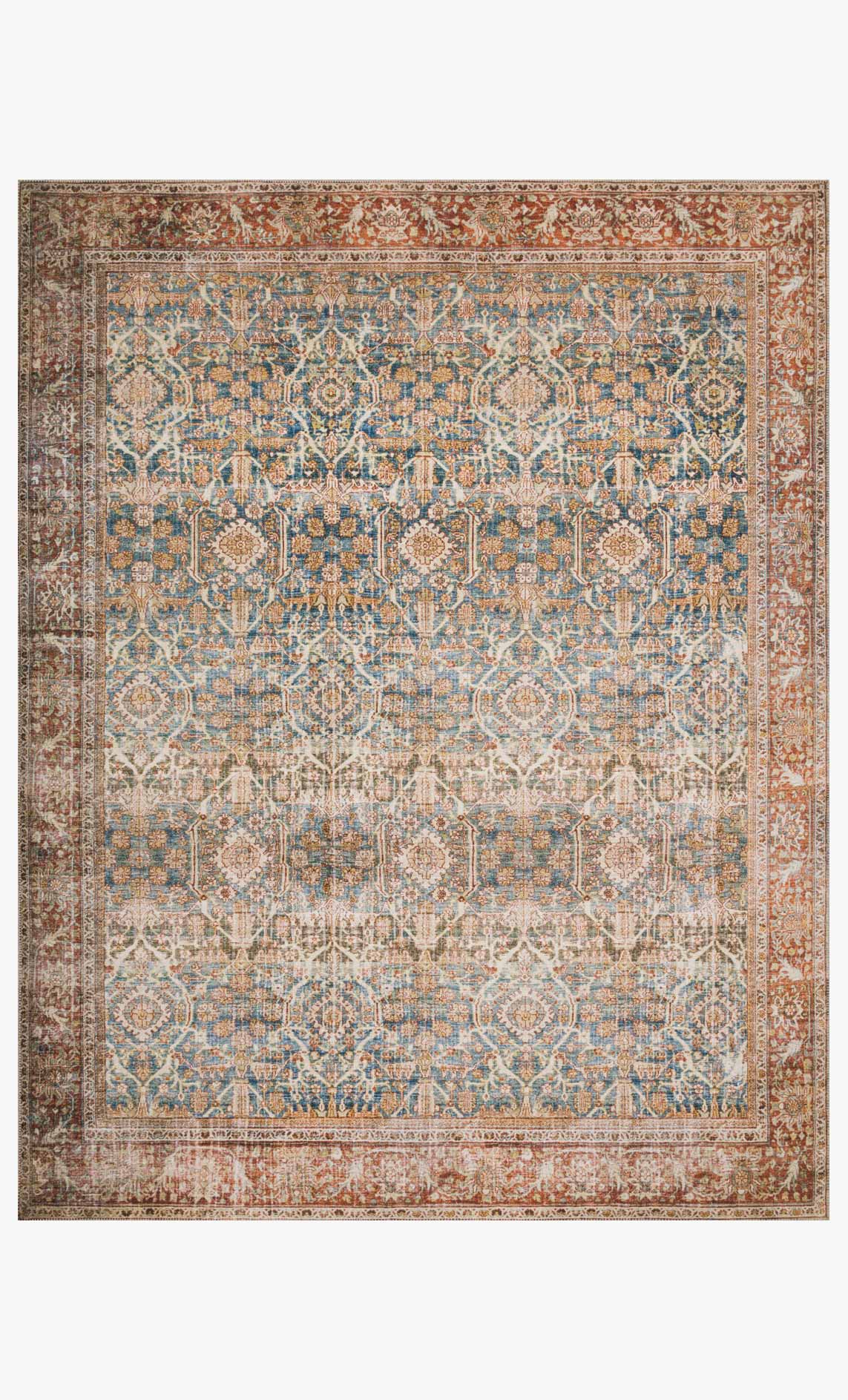 Traditional power-loomed rug with ornate medallion pattern, blue and rust border.