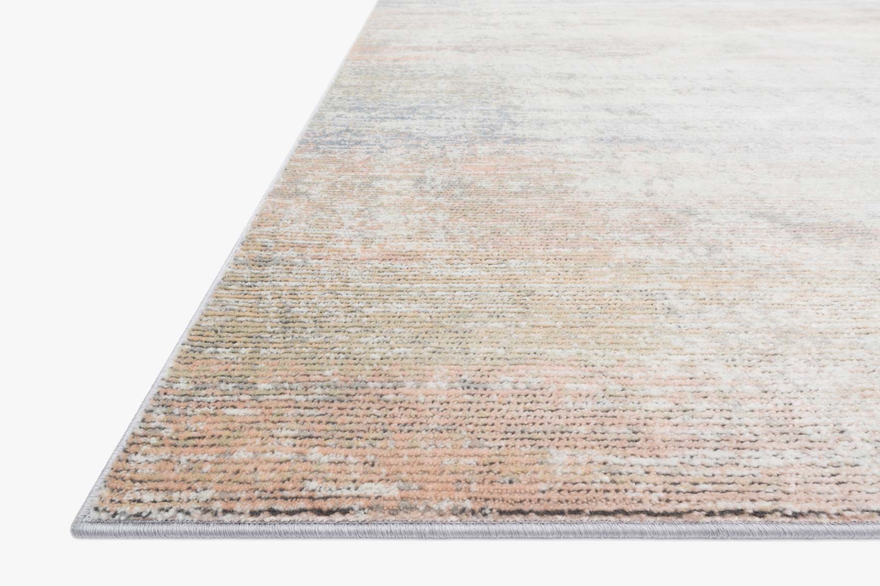 Power loomed rug corner in mist tone with light beige and blue-gray abstract weave