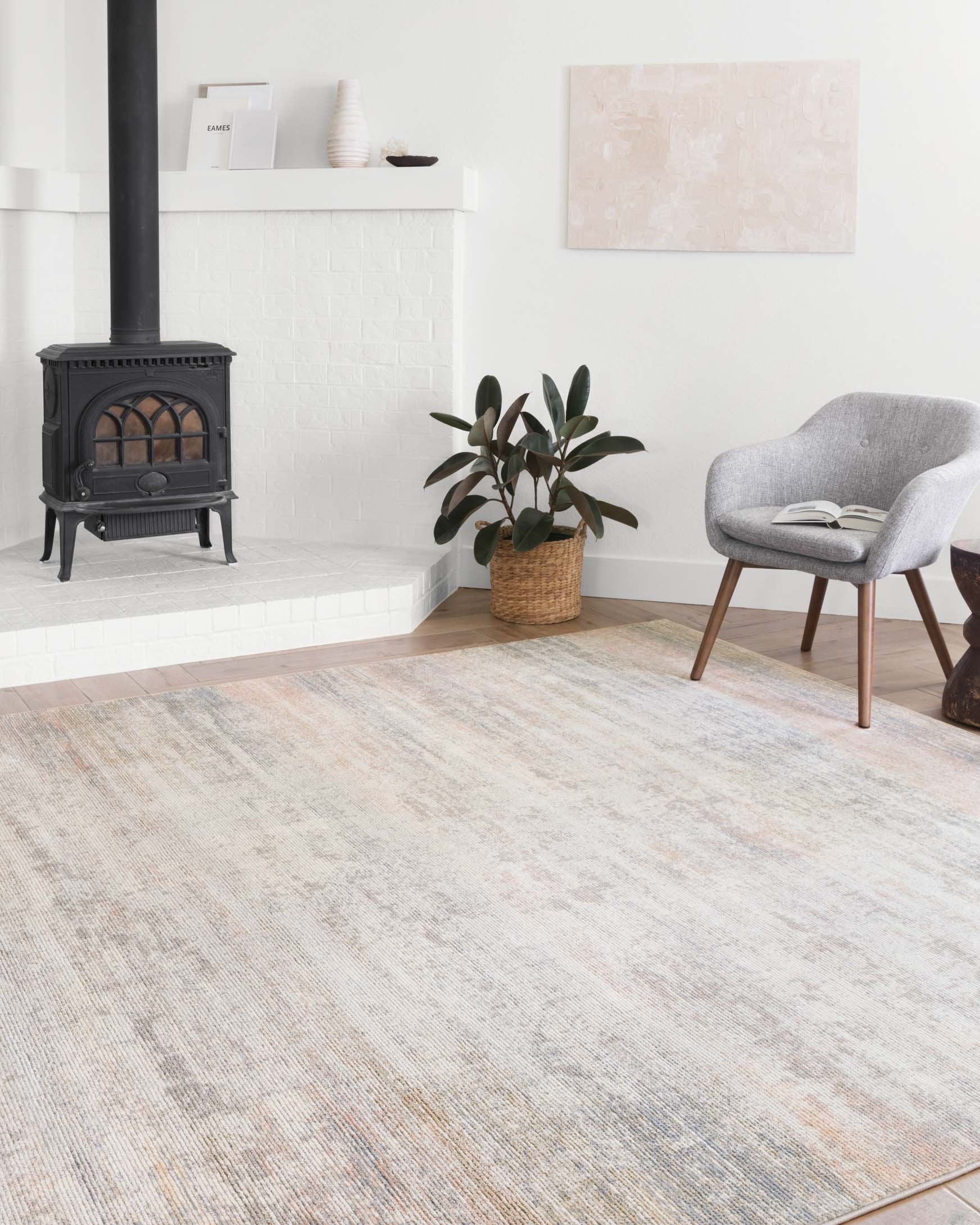 Transitional power loomed rug in mist tone with light beige, gray, and muted rust abstract texture