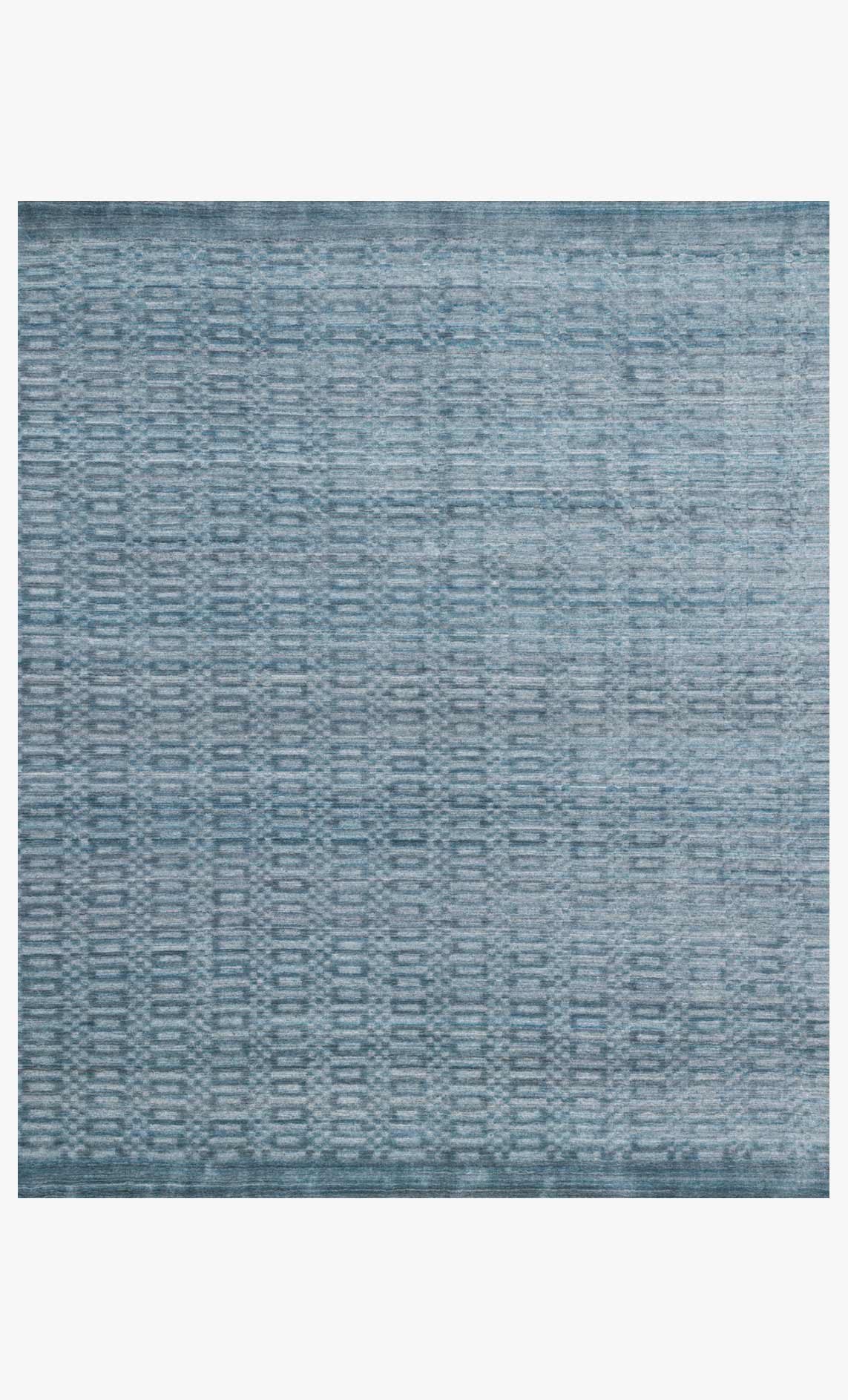 Ocean blue hand-loomed rug with textured geometric grid pattern.