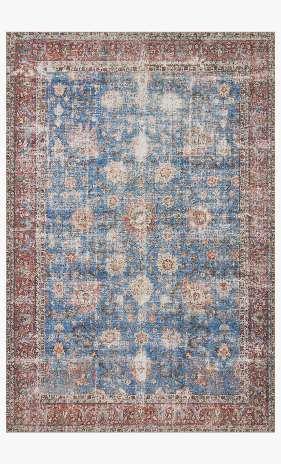 Traditional power-loomed rug with ornate blue and brick/red pattern, border details
