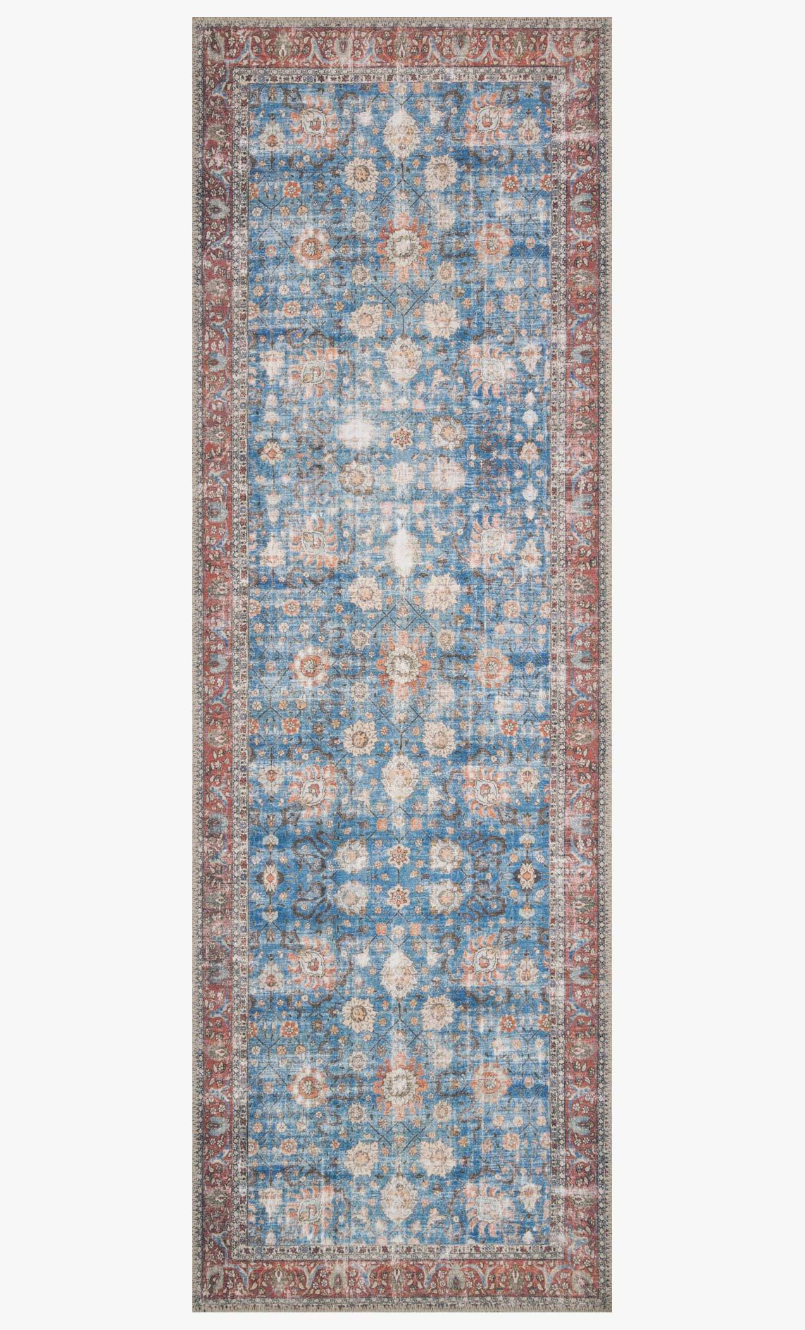 Rectangular traditional power-loomed rug with blue and brick/red floral pattern