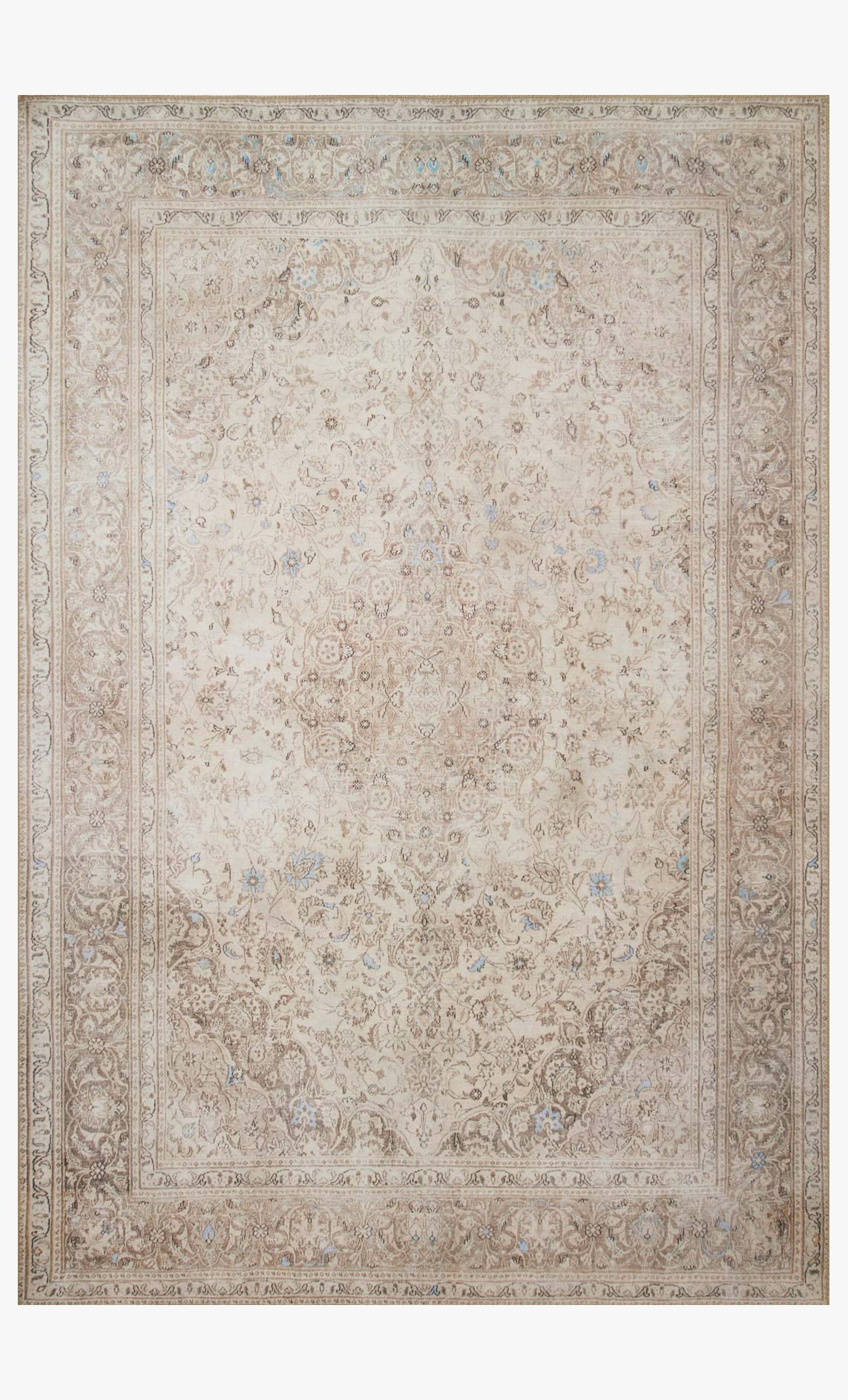 Traditional power-loomed rug in sand and taupe with ornate medallion and border pattern