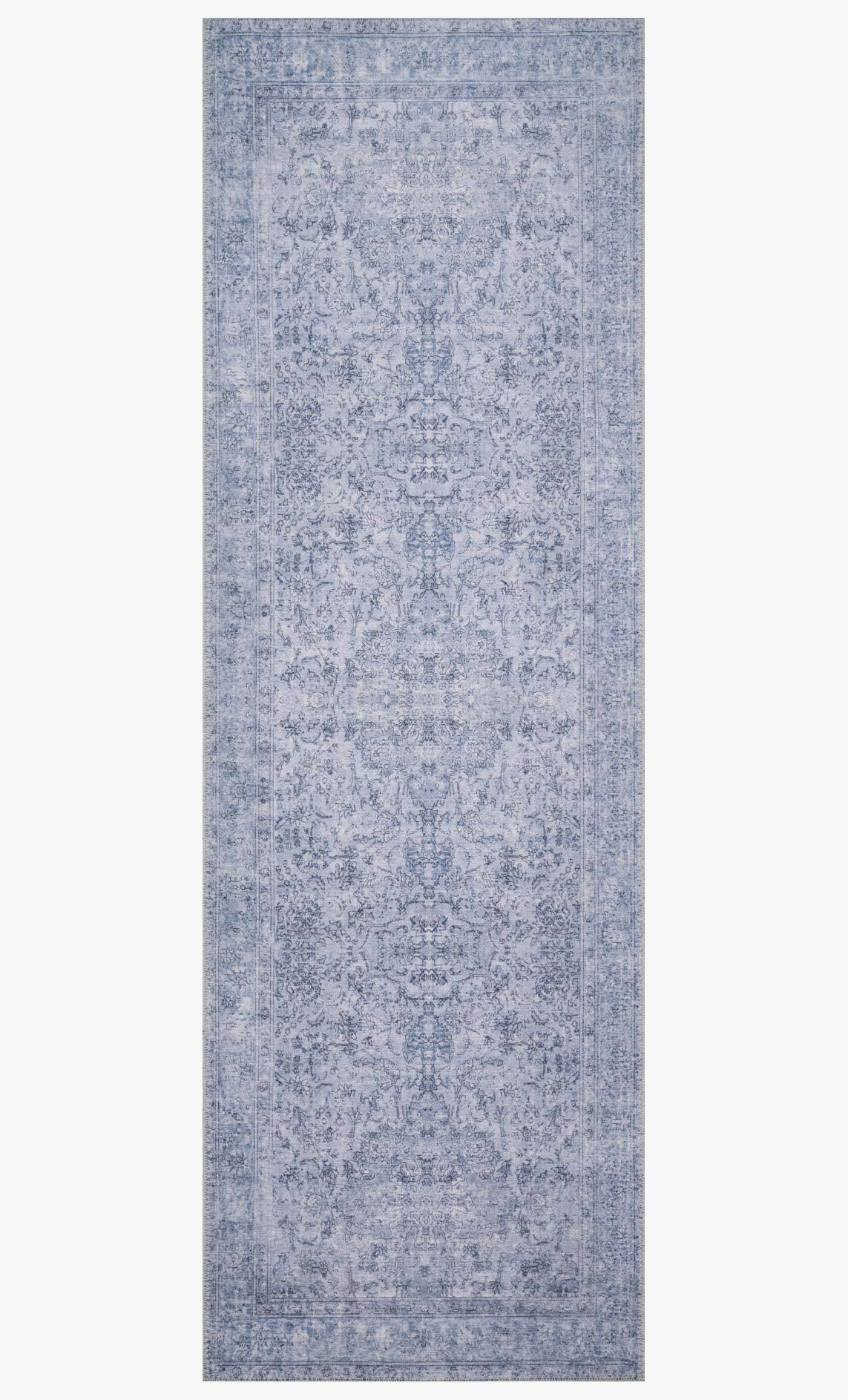 Slate blue traditional area rug with repeating ornamental design