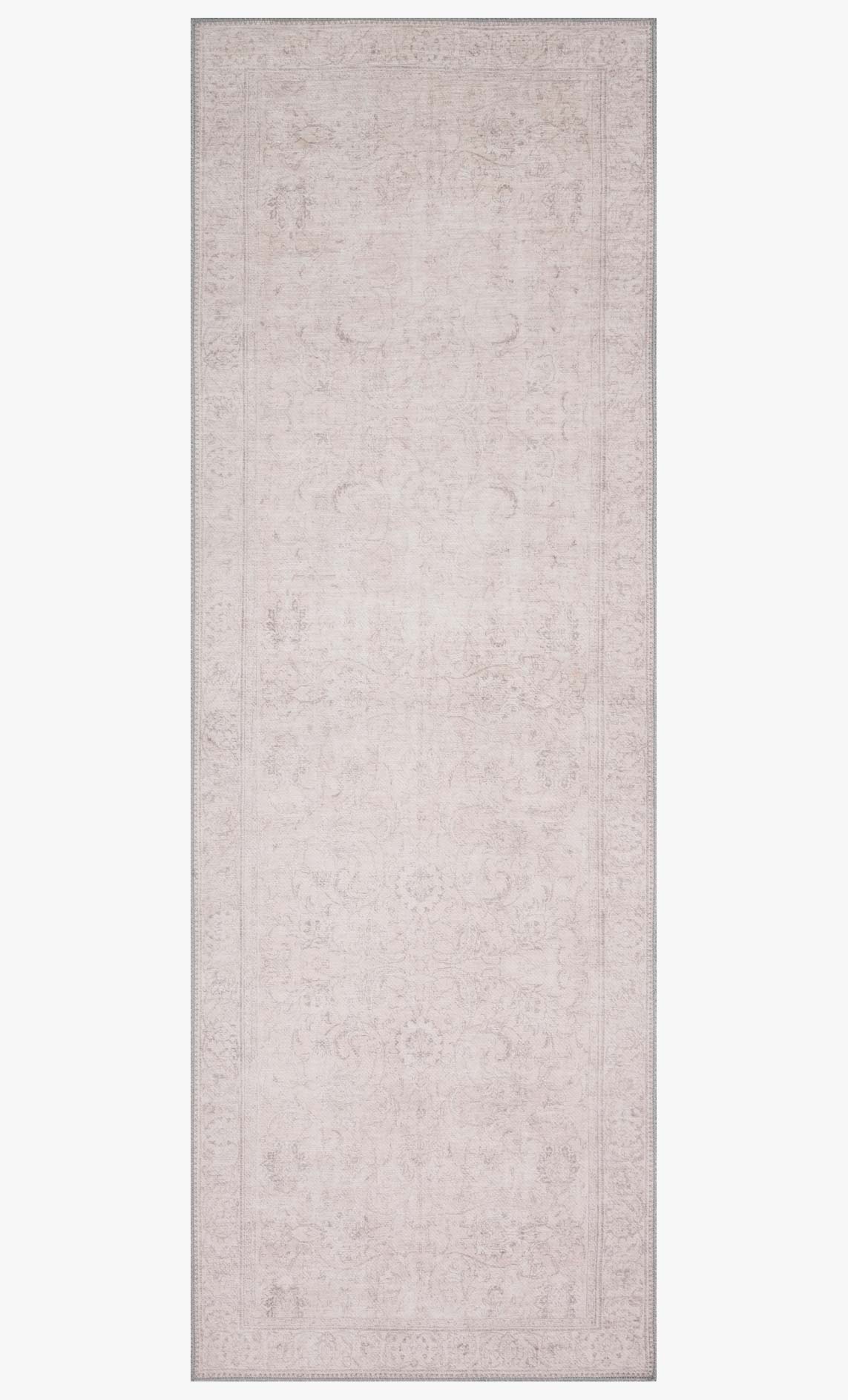 Rectangular sand-toned rug with subtle tonal damask-style pattern