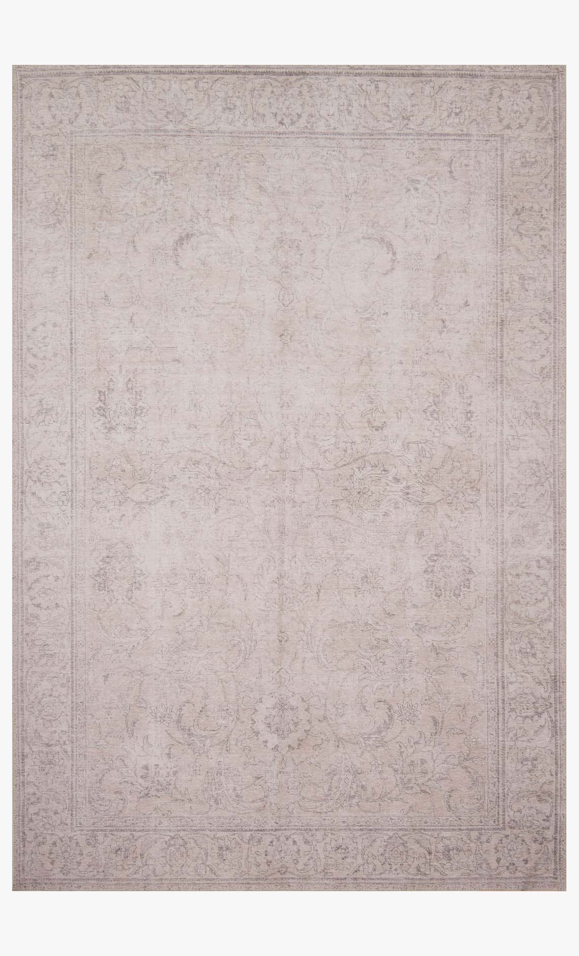 Sand-tone traditional power-loomed rug with subtle ornate pattern and flat border