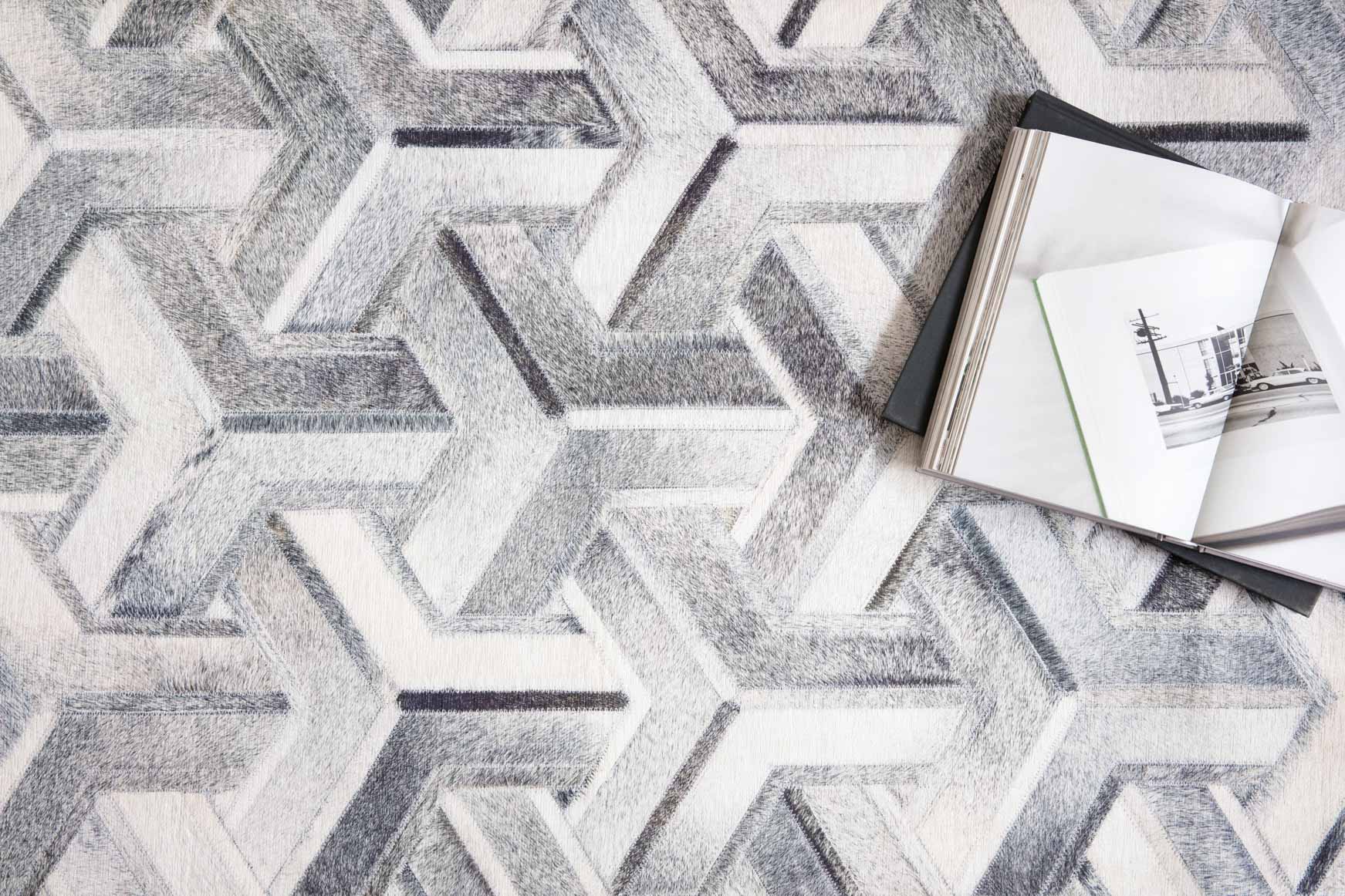 Silver and ivory chevron zigzag rug texture detail with high-contrast patterning