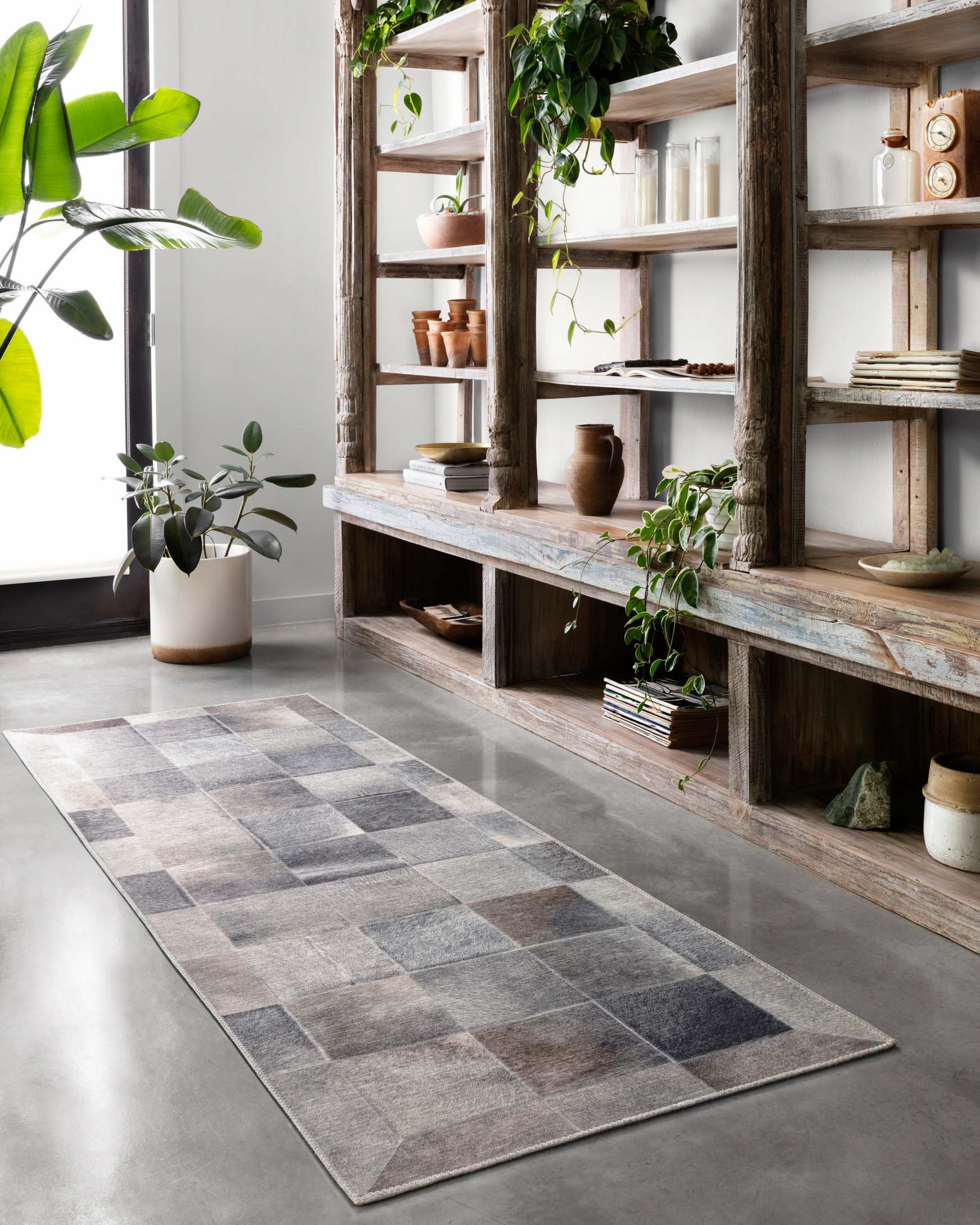 Rectangular charcoal and grey rug with blended square checker pattern