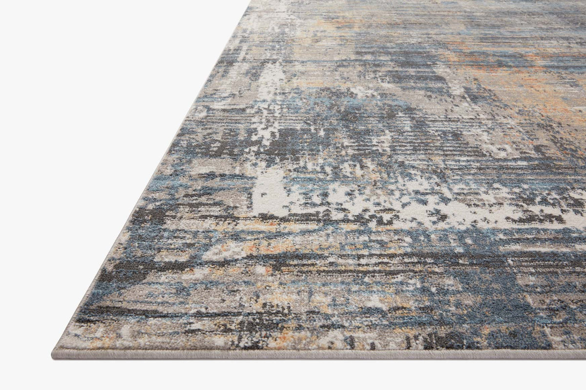 Slate blue and apricot distressed abstract area rug with low-profile flat texture