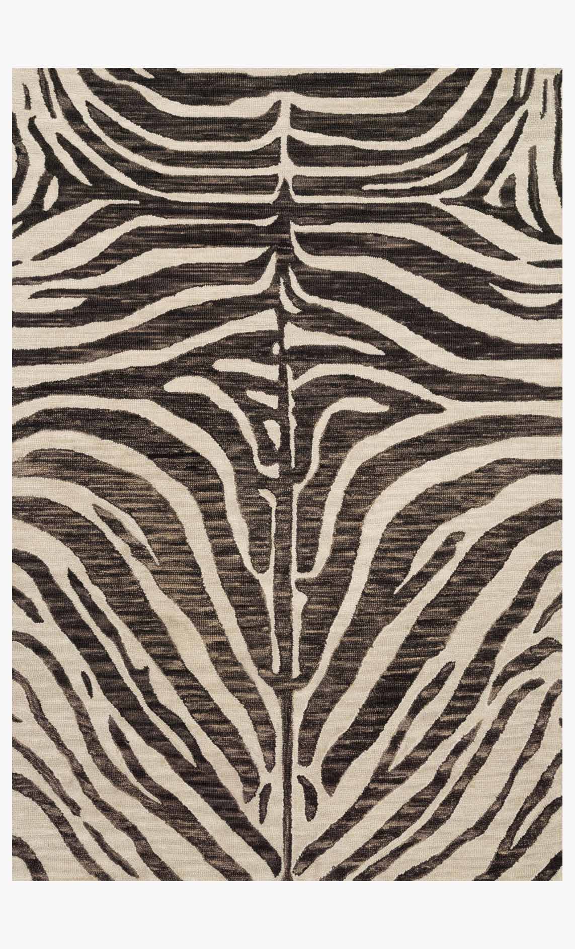 Contemporary hooked rug with ivory base and dark brown zebra stripe pattern, flat view