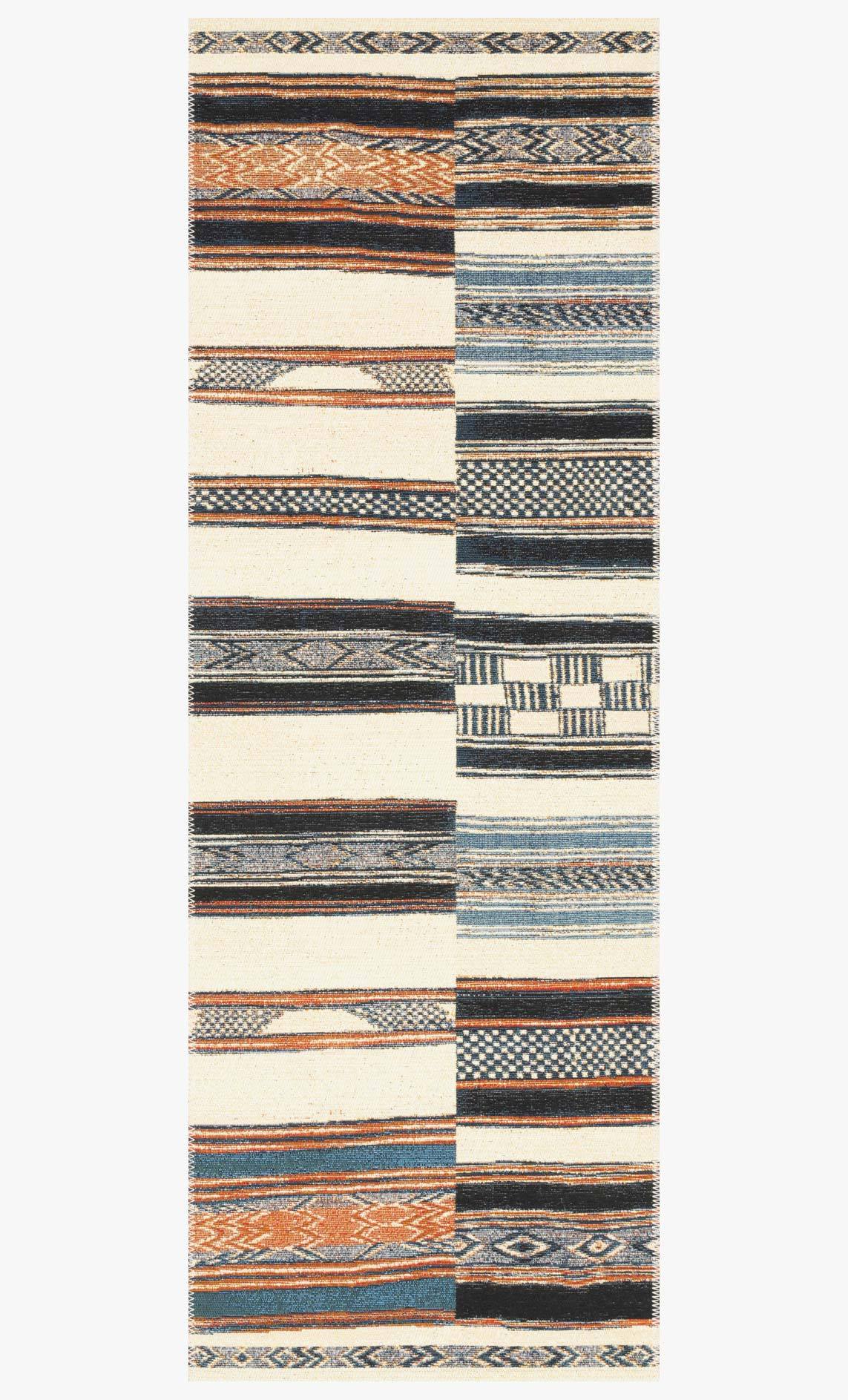 Rectangular ivory rug with geometric patchwork blocks in blue, navy, and orange