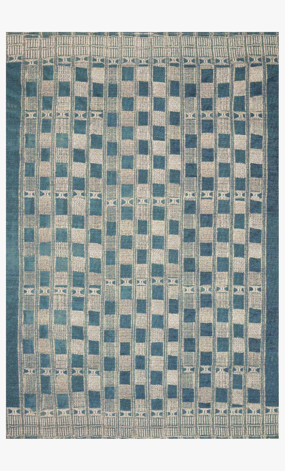 Indoor/outdoor power loomed rug with blue and ivory check pattern